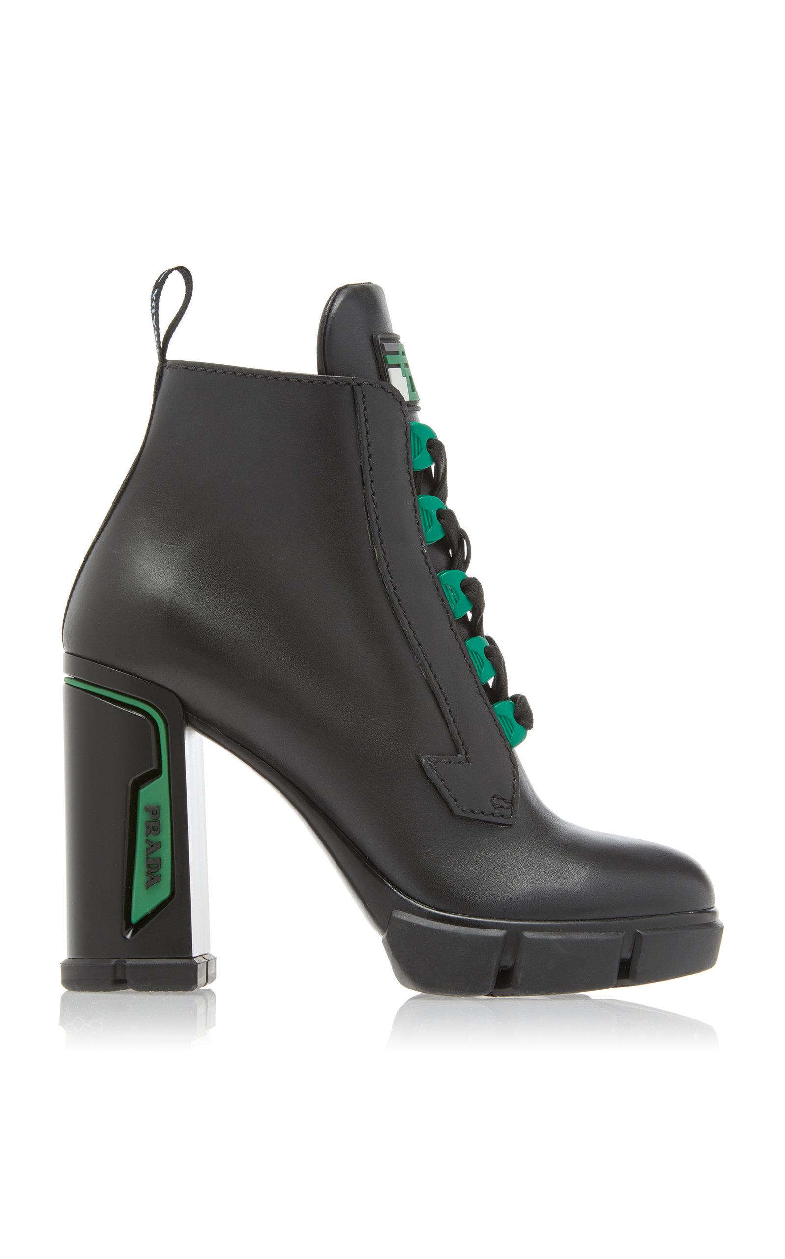 Prada Tronchetti Leather Ankle Boots in Black | Lyst