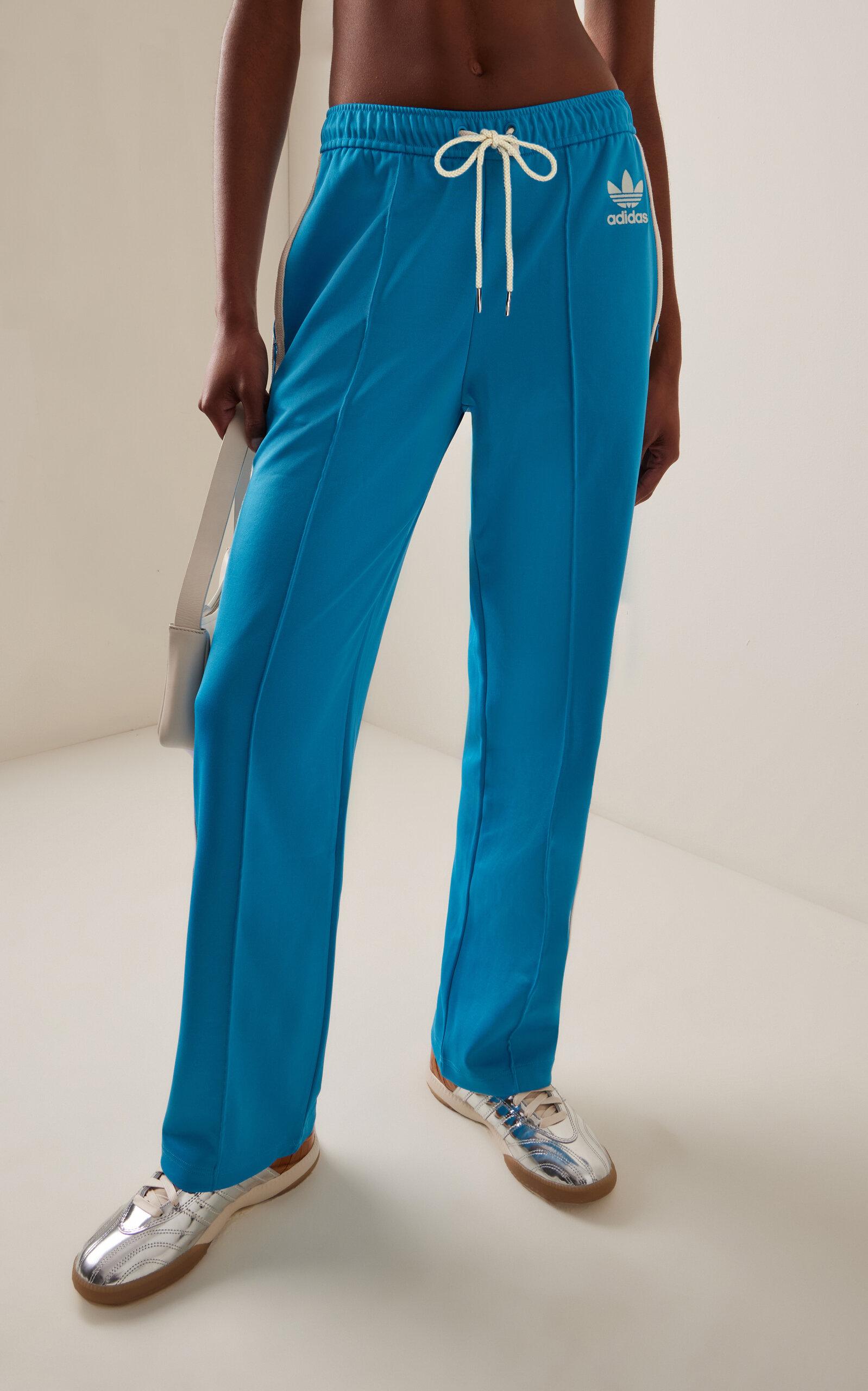 Adidas track pants blue with red stripes hotsell