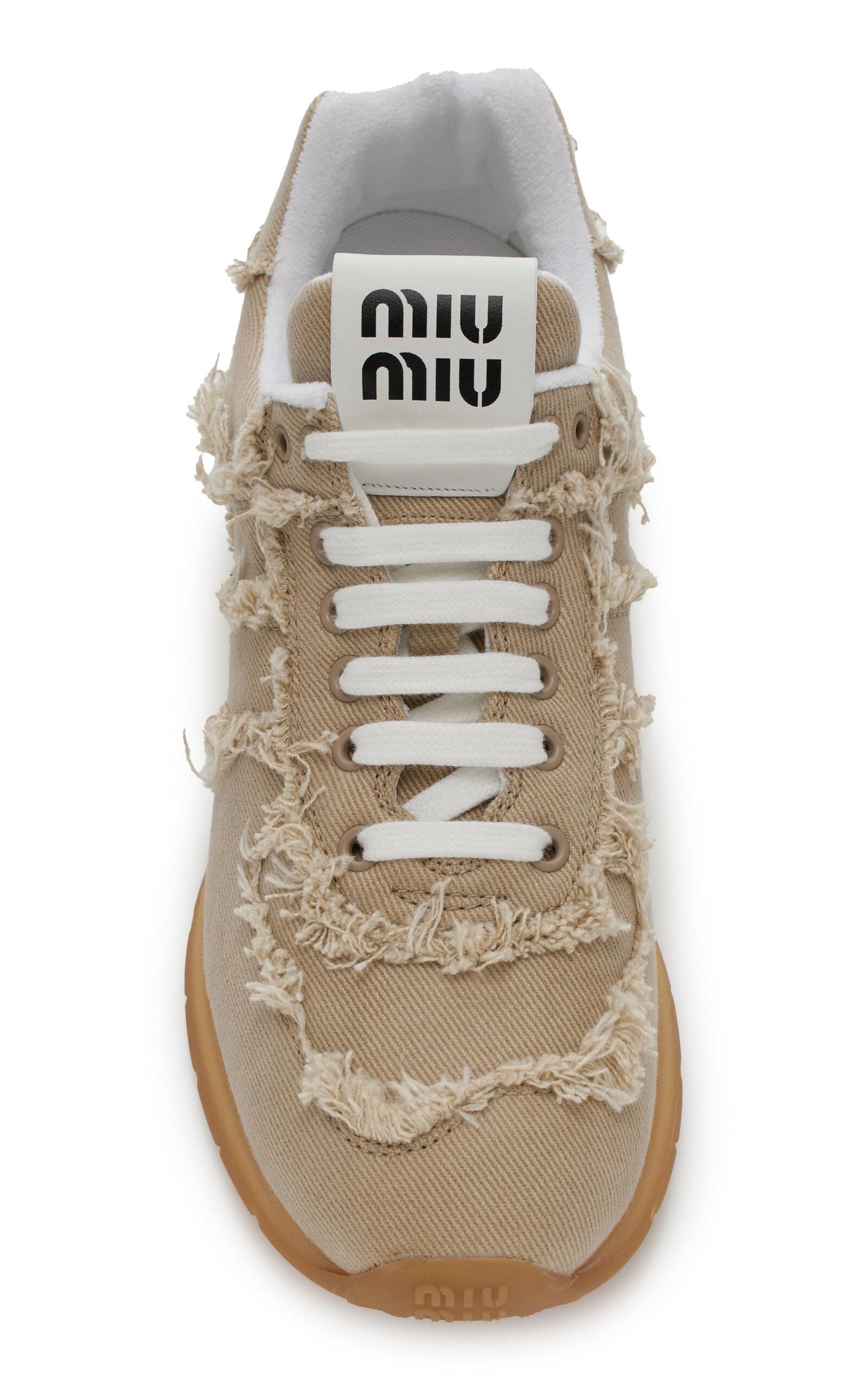 スニーカー MIU MIIU 5T385E_CSL_F0304 WASHED DENIM HIGT TOP SNEAKERS Miu Miu washed-denim Sneakers | Neutrals | FARFETCH