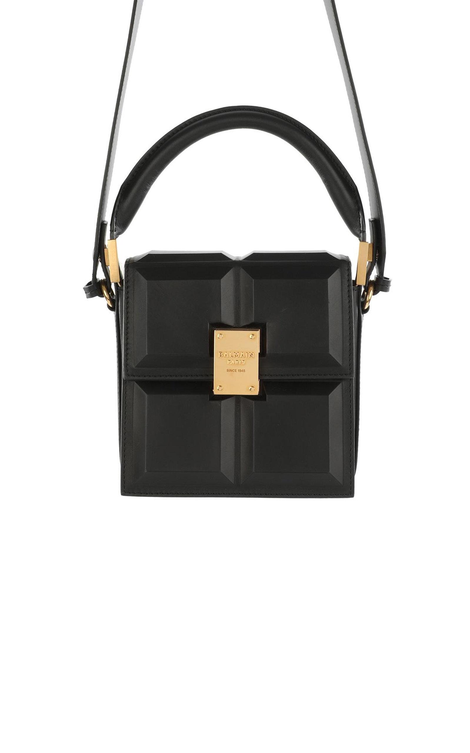 black structured handbolsa