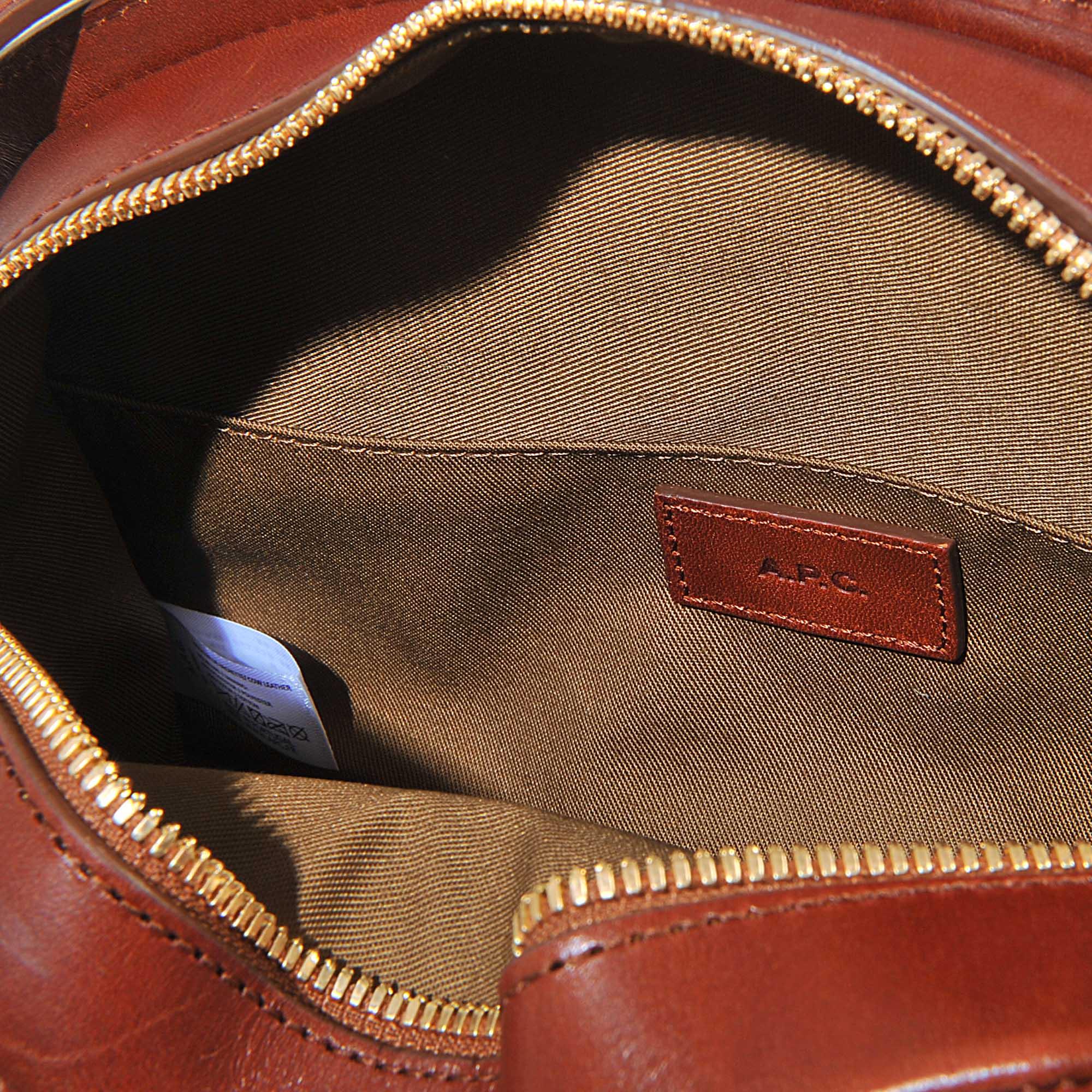Tasche Demi Lune aus hazelnussbraunem Klabsleder A.P.C. Schultertasche Demi Lune aus Leder Braun Damen