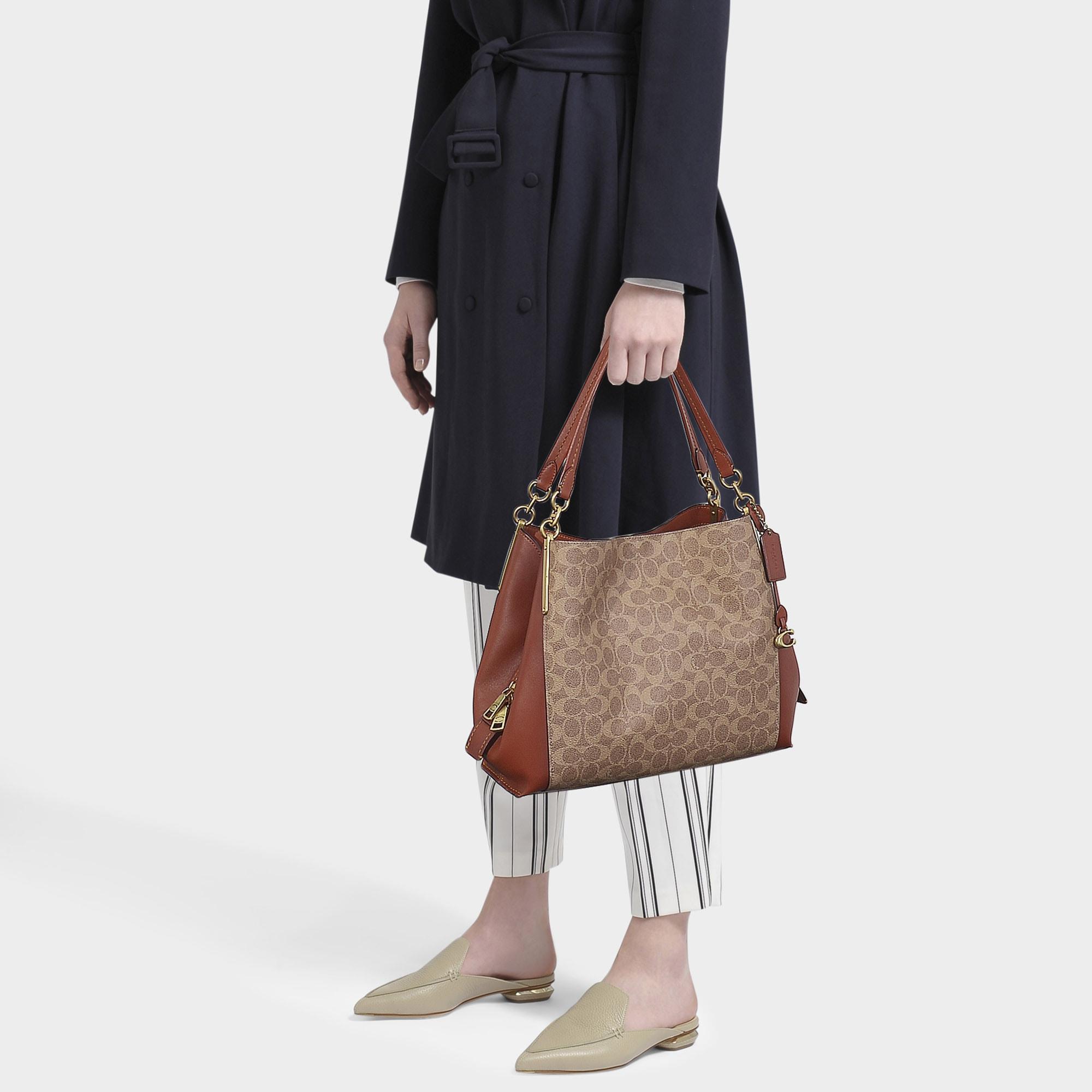 COACH Dalton 31 Bag In Rust And Tan Signature Coated Canvas in Brown | Lyst