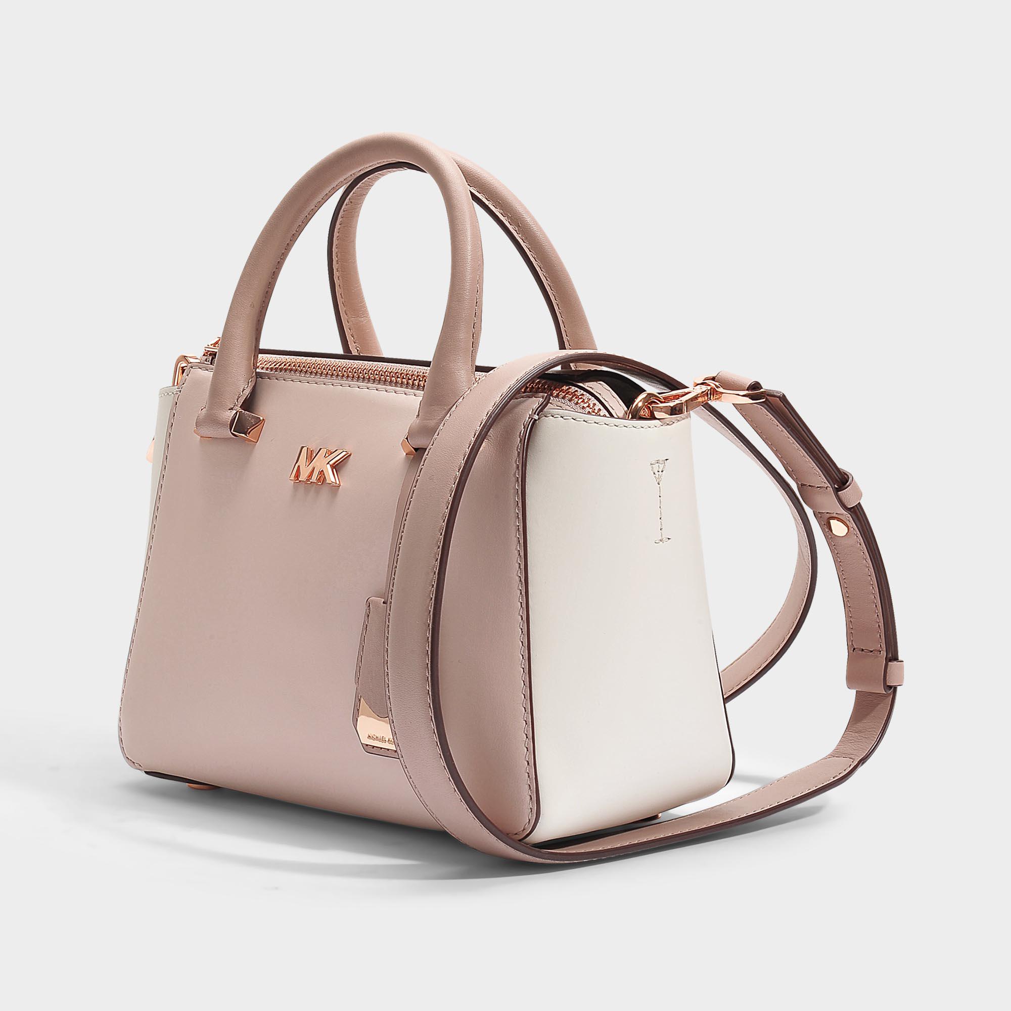 pink and white michael kors purse