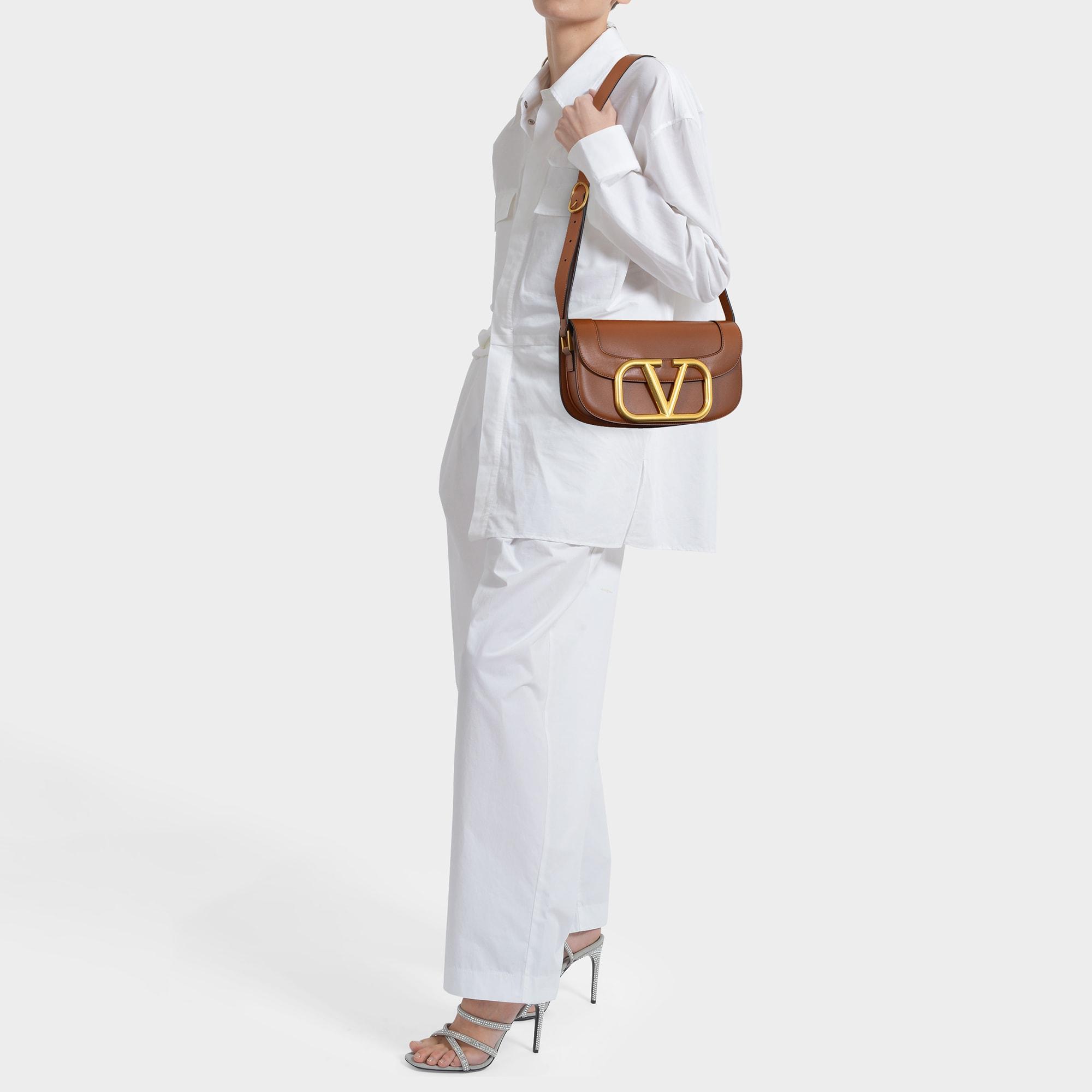 Valentino Garavani Leather Supervee Calfskin Crossbody Bag in Brown