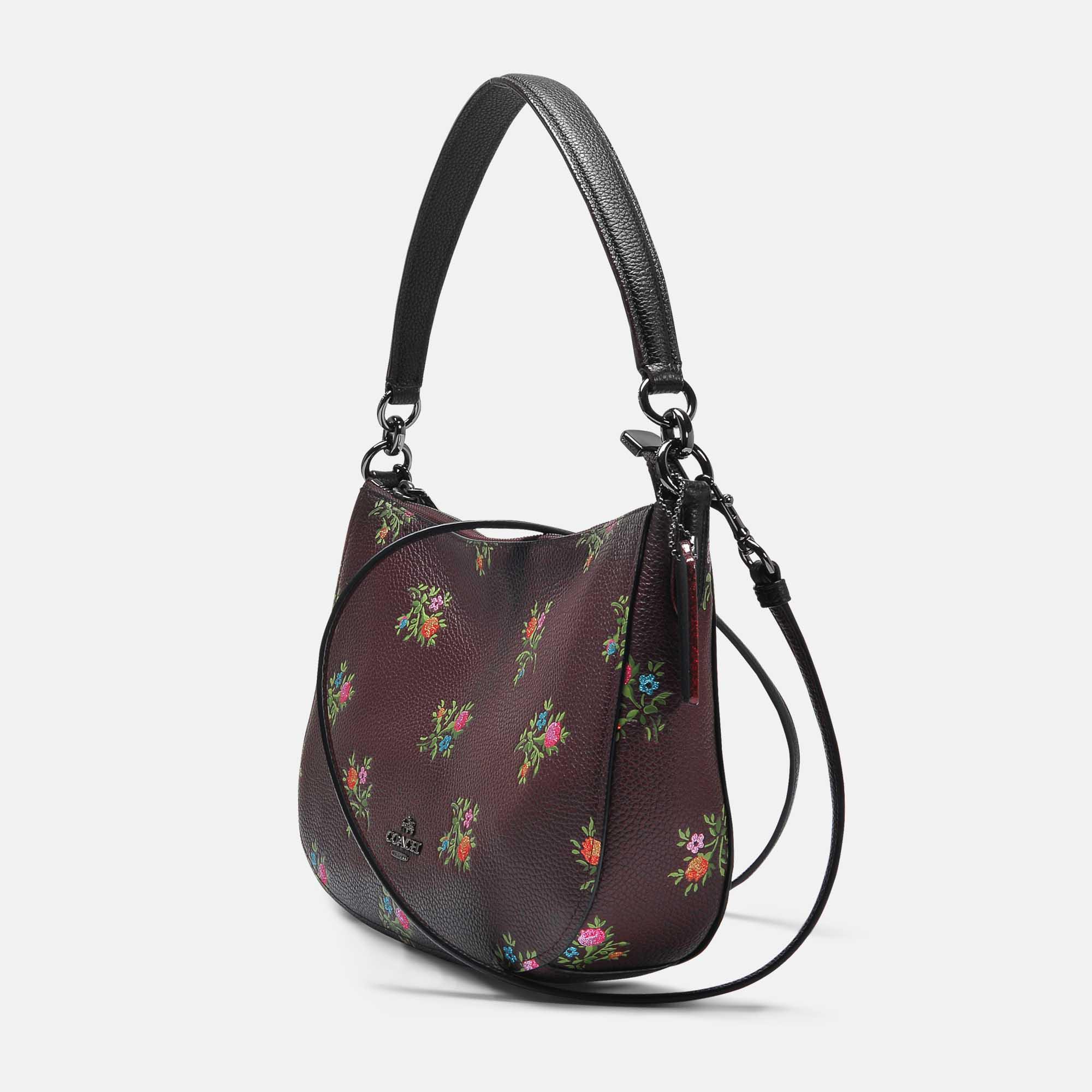 coach bag with purple flowers