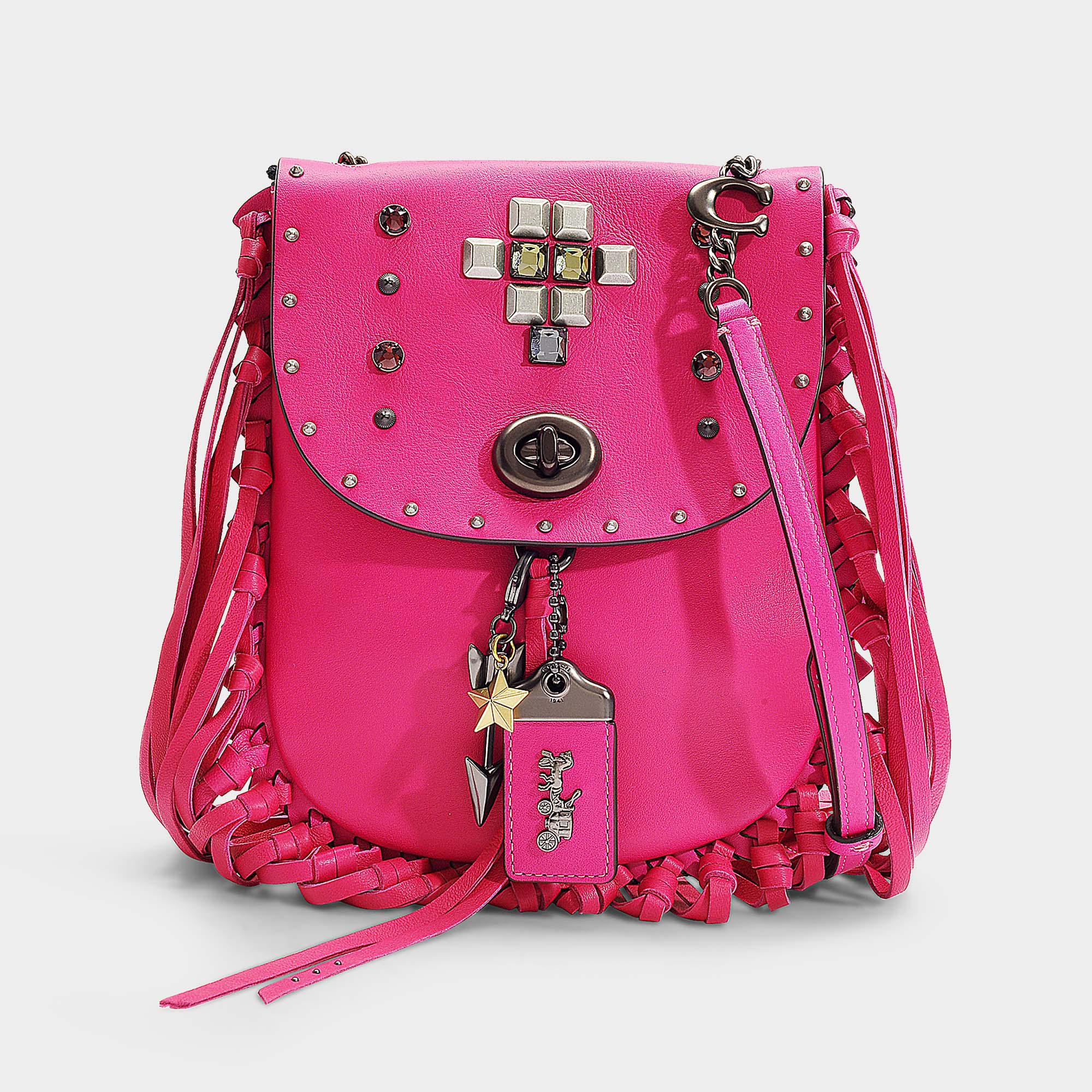COACH Textured Pyramid Rivets Fringe Saddle Bag In Fuchsia Leather in