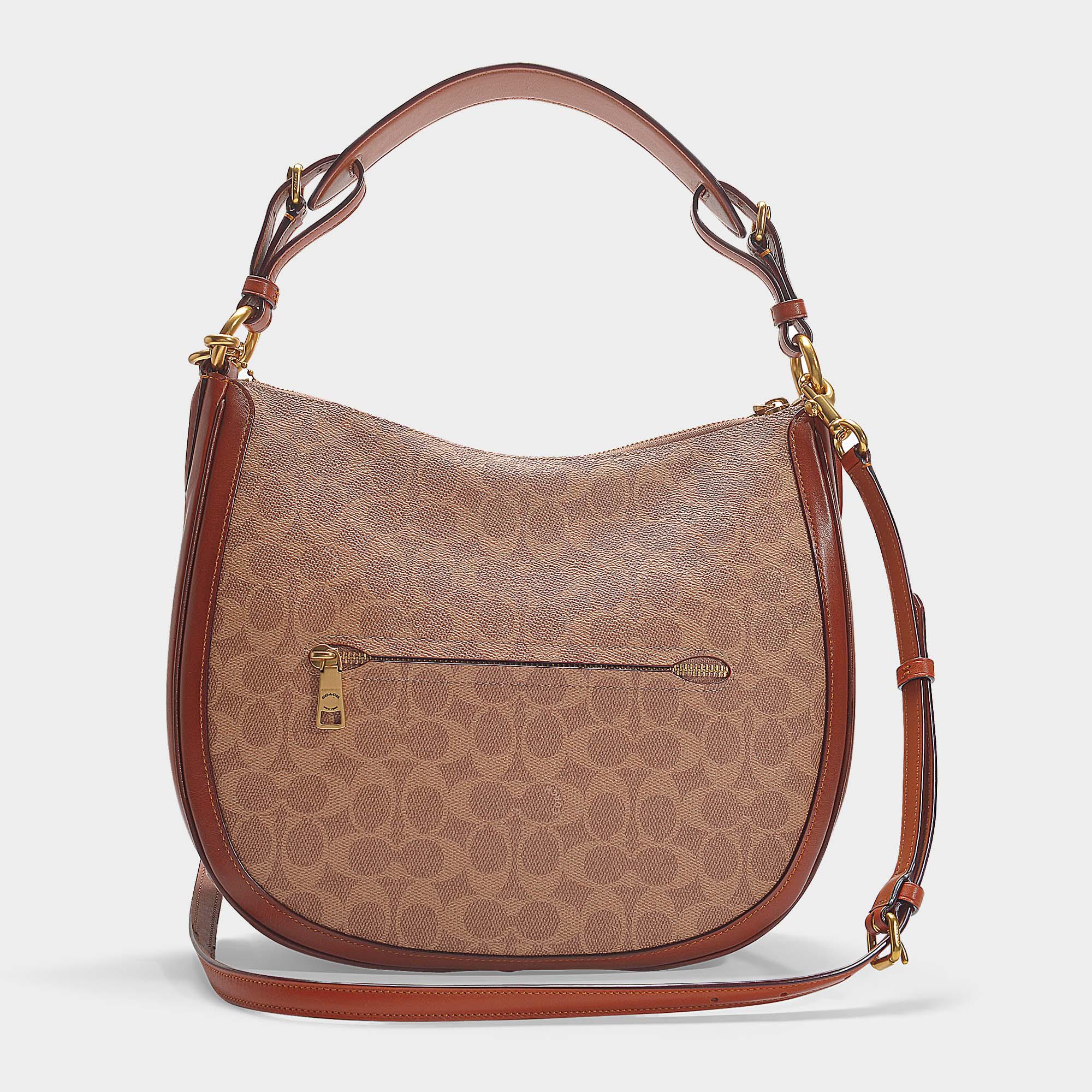 COACH Coated Canvas Signature Sutton Hobo in Beige (Natural) Lyst