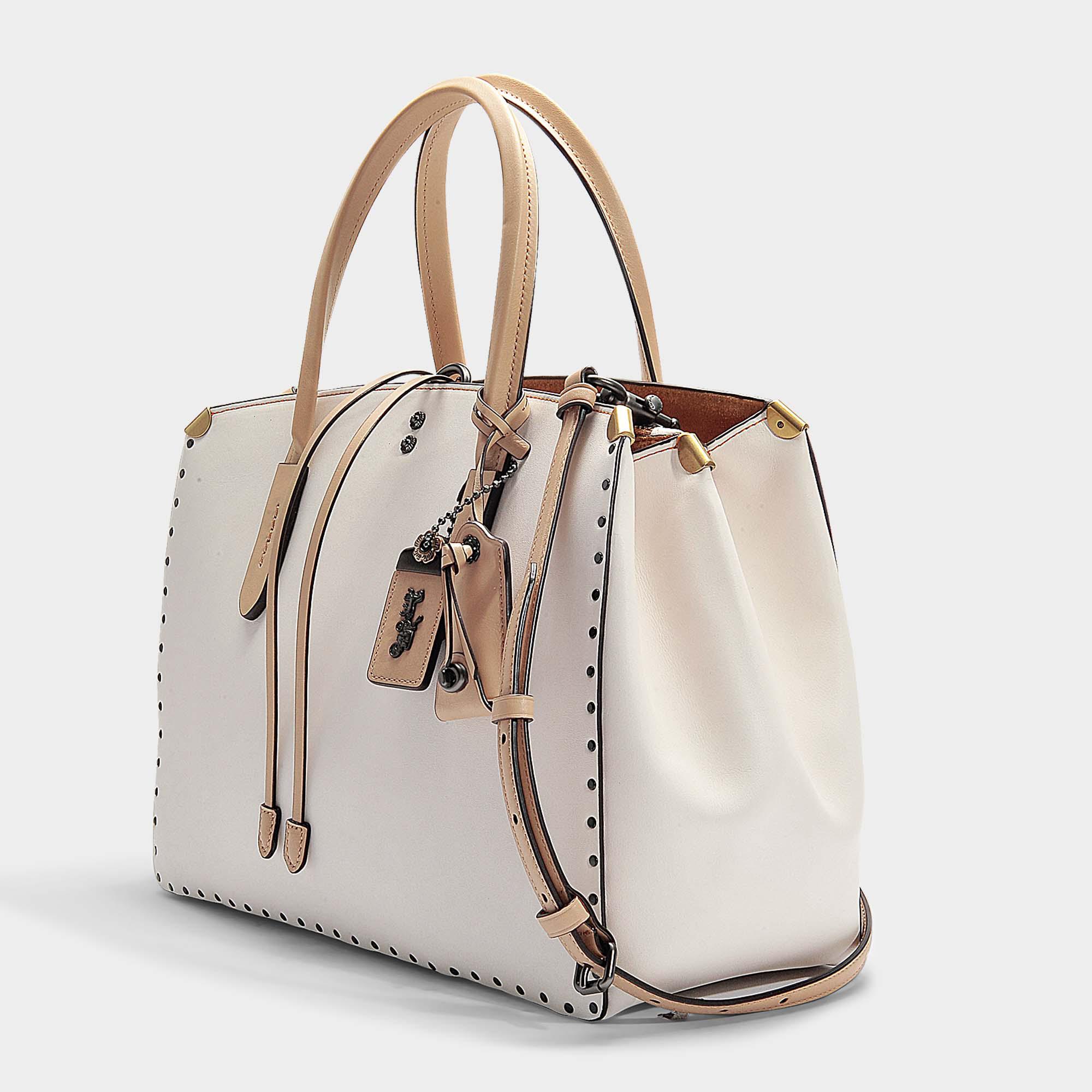 Coach cooper cheap carryall with rivets