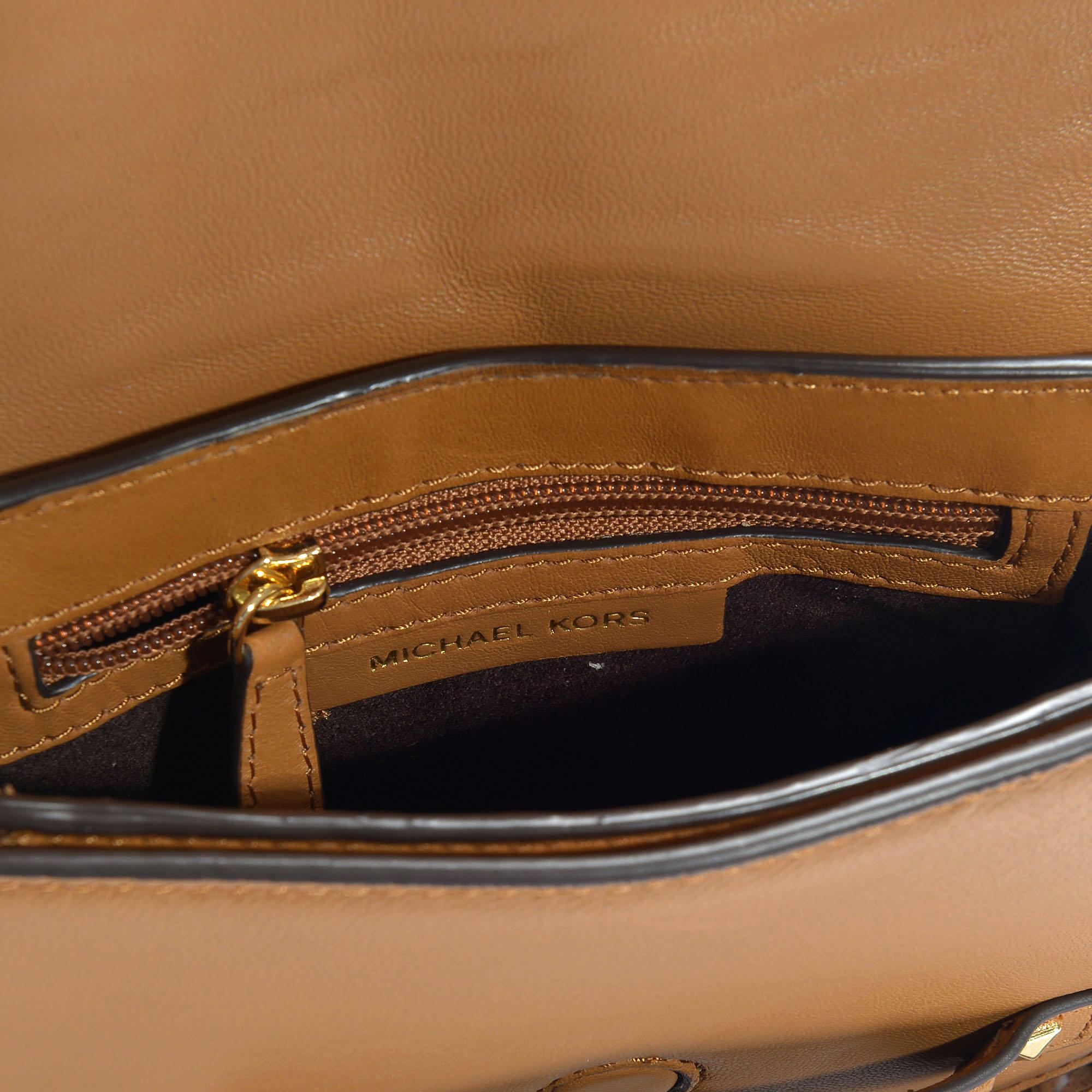 Cary small grommeted leather saddle bag top