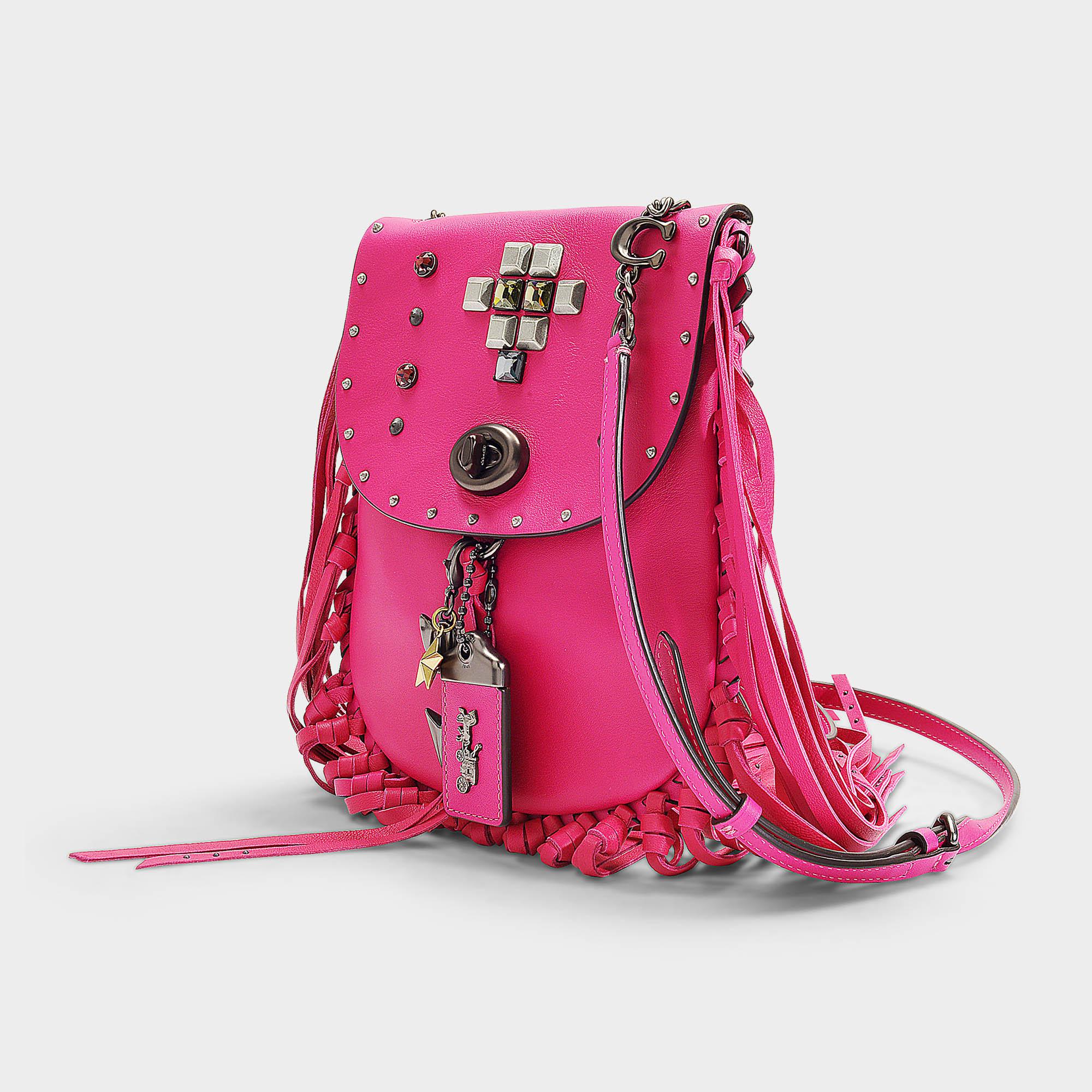 coach fringe saddle bag