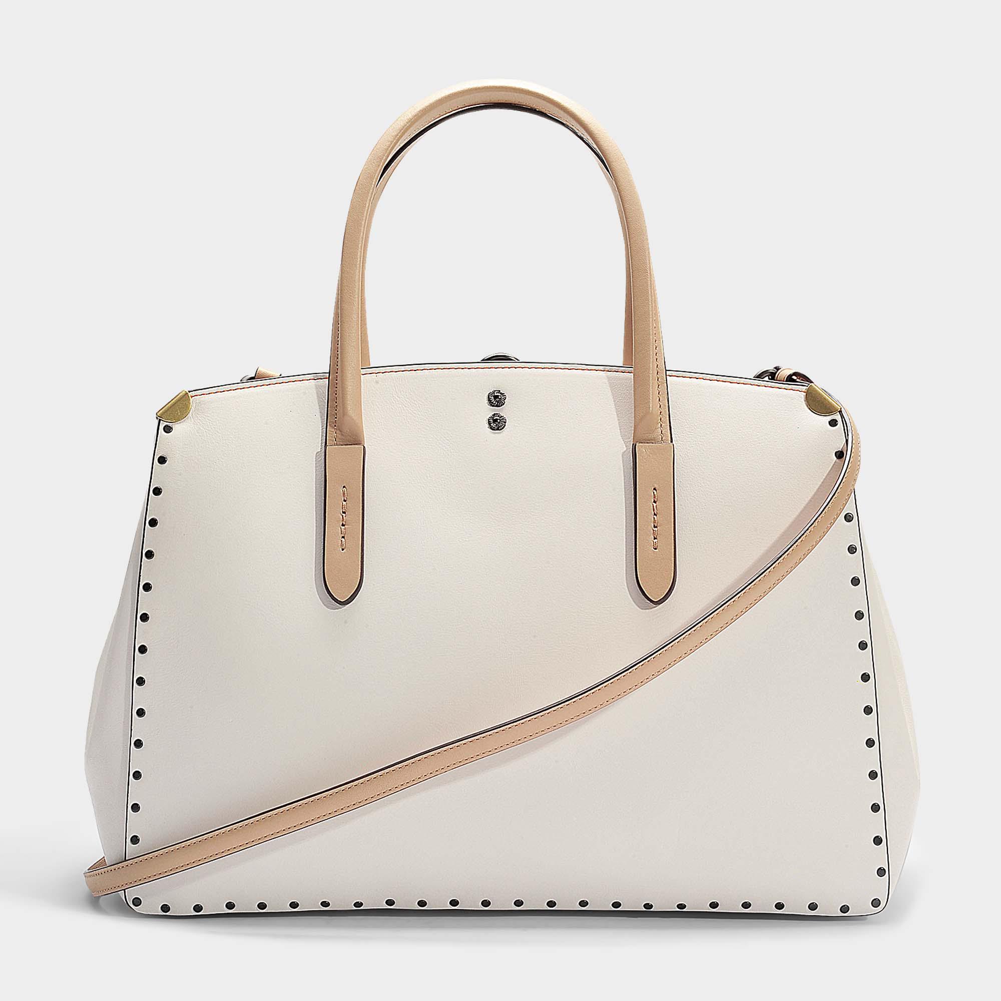Coach cooper carryall with rivets sale