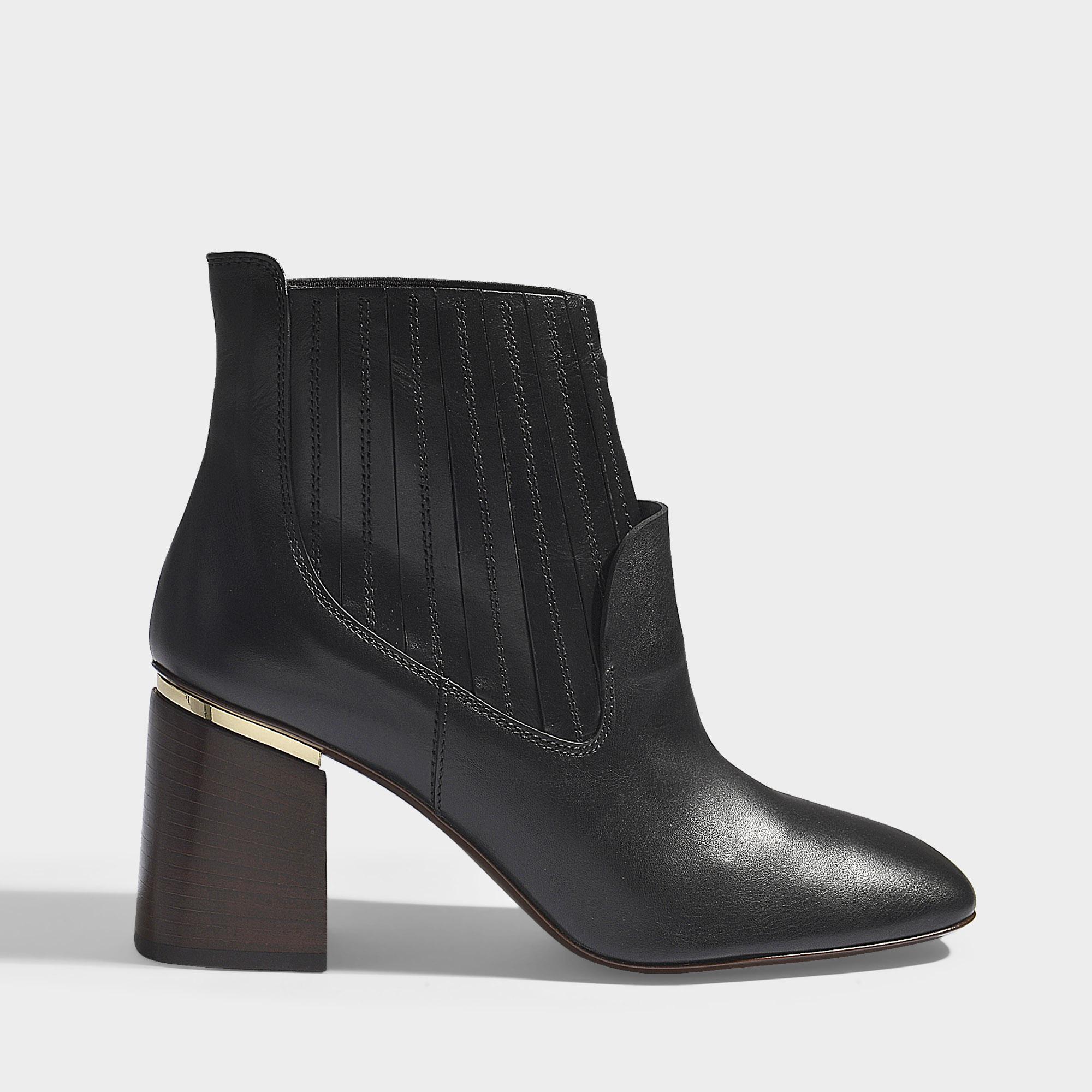 black booties with silver heel