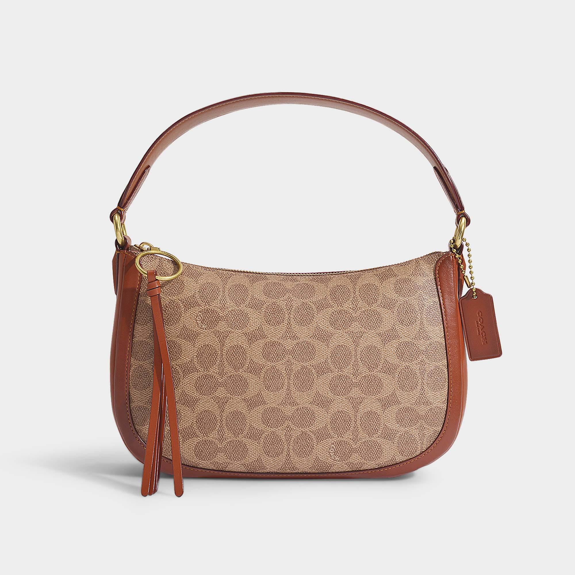 Signature Coated Canvas Sutton Crossbody Bag In Brown Pvc Signature Coated Canvas Sutton Crossbody Bag In Brown Pvc