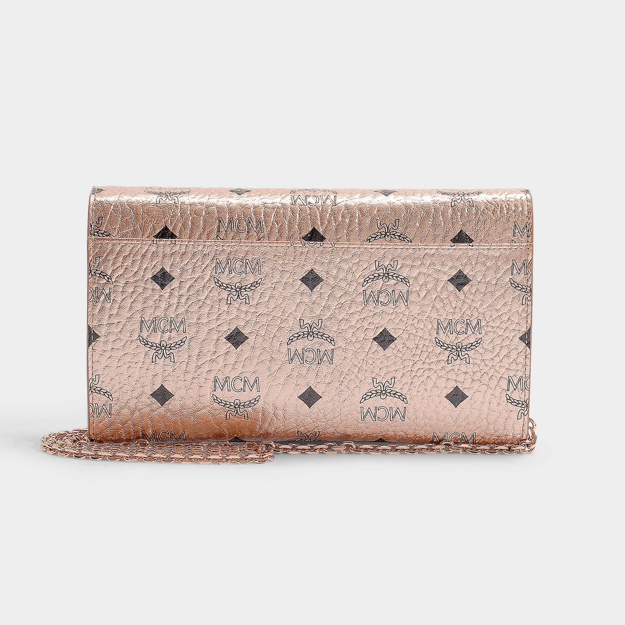 mcm coated canvas wallet on a chain