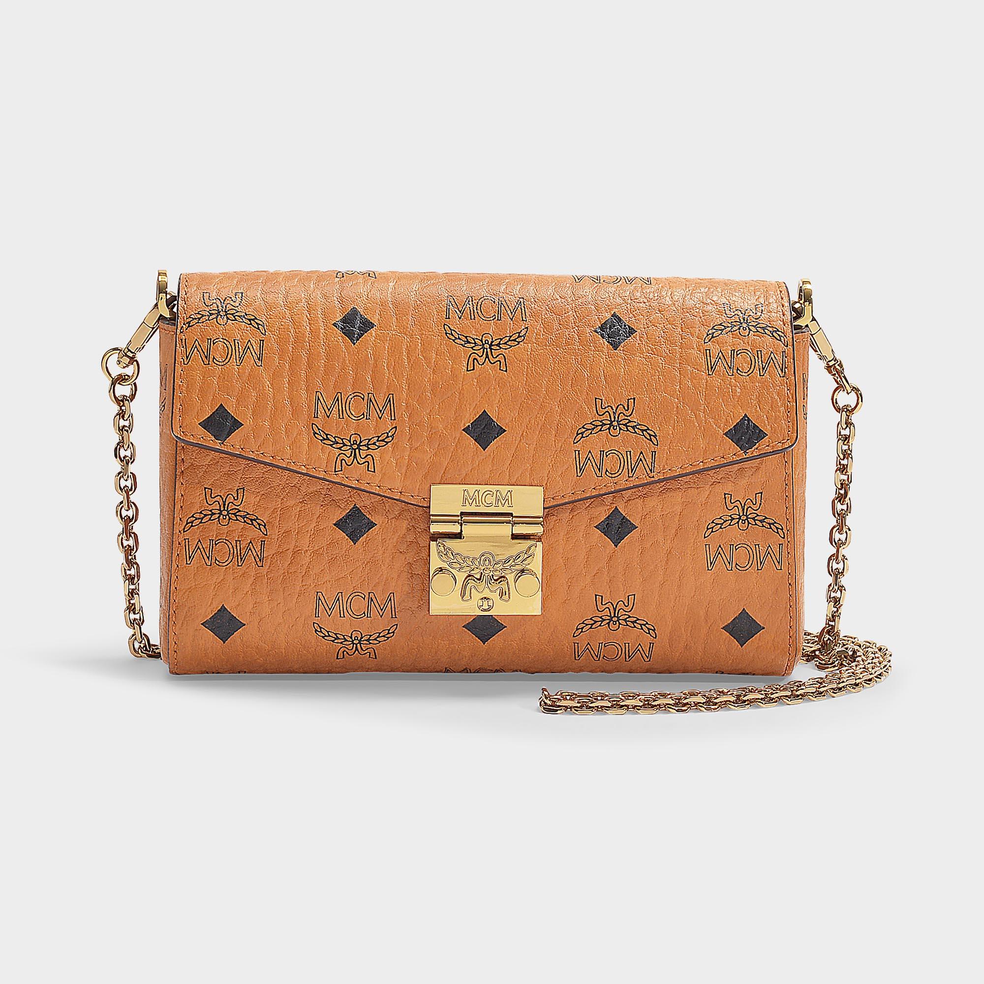 MCM Millie Visetos Small Crossbody Bag In Cognac Coated Canvas in Brown
