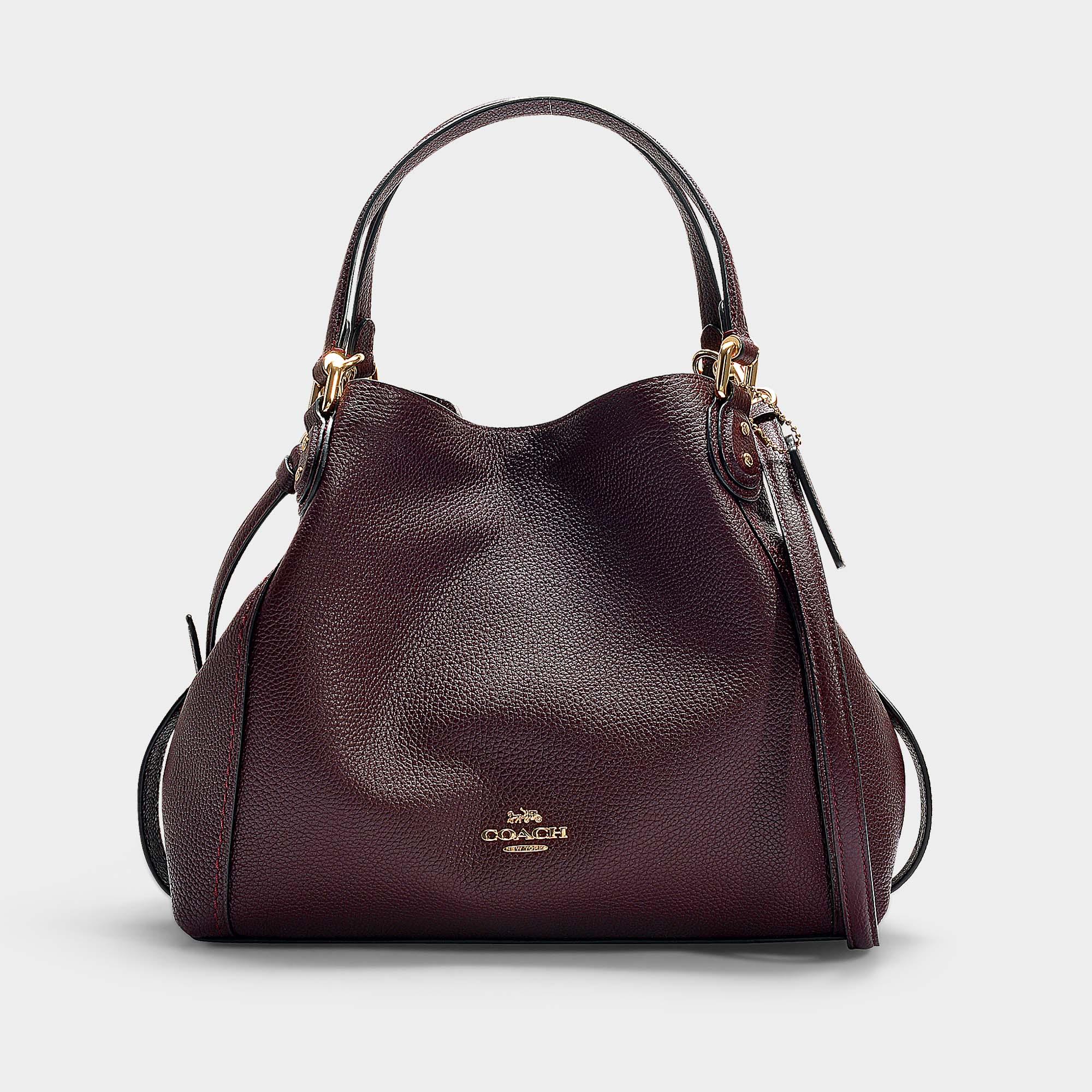 COACH Polished Pebble Leather Edie 28 Shoulder Bag In Burgundy Calfskin in Red - Lyst