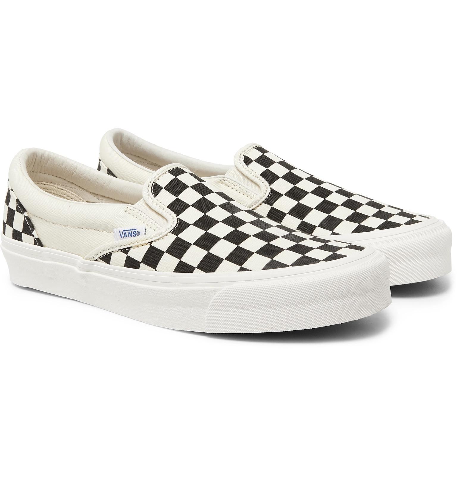 tan and white checkerboard vans