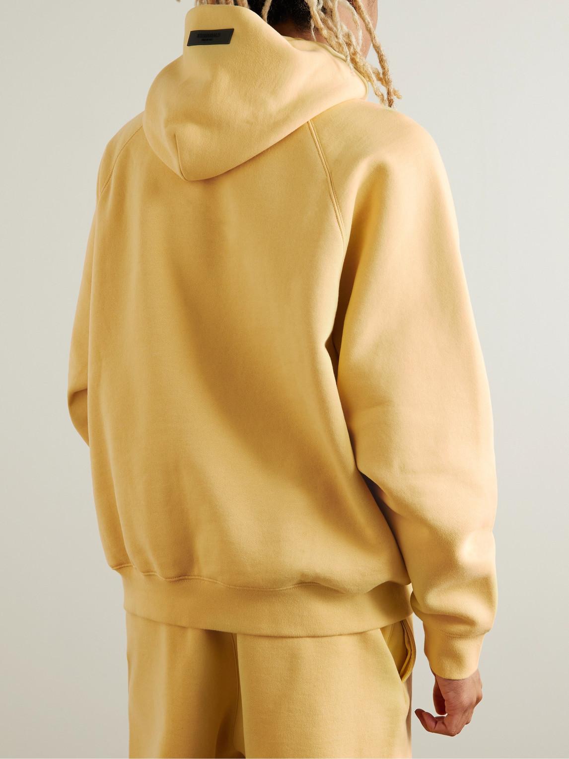 Fear of God ESSENTIALS Logo-appliquéd Cotton-blend Jersey Hoodie in Yellow  for Men | Lyst UK
