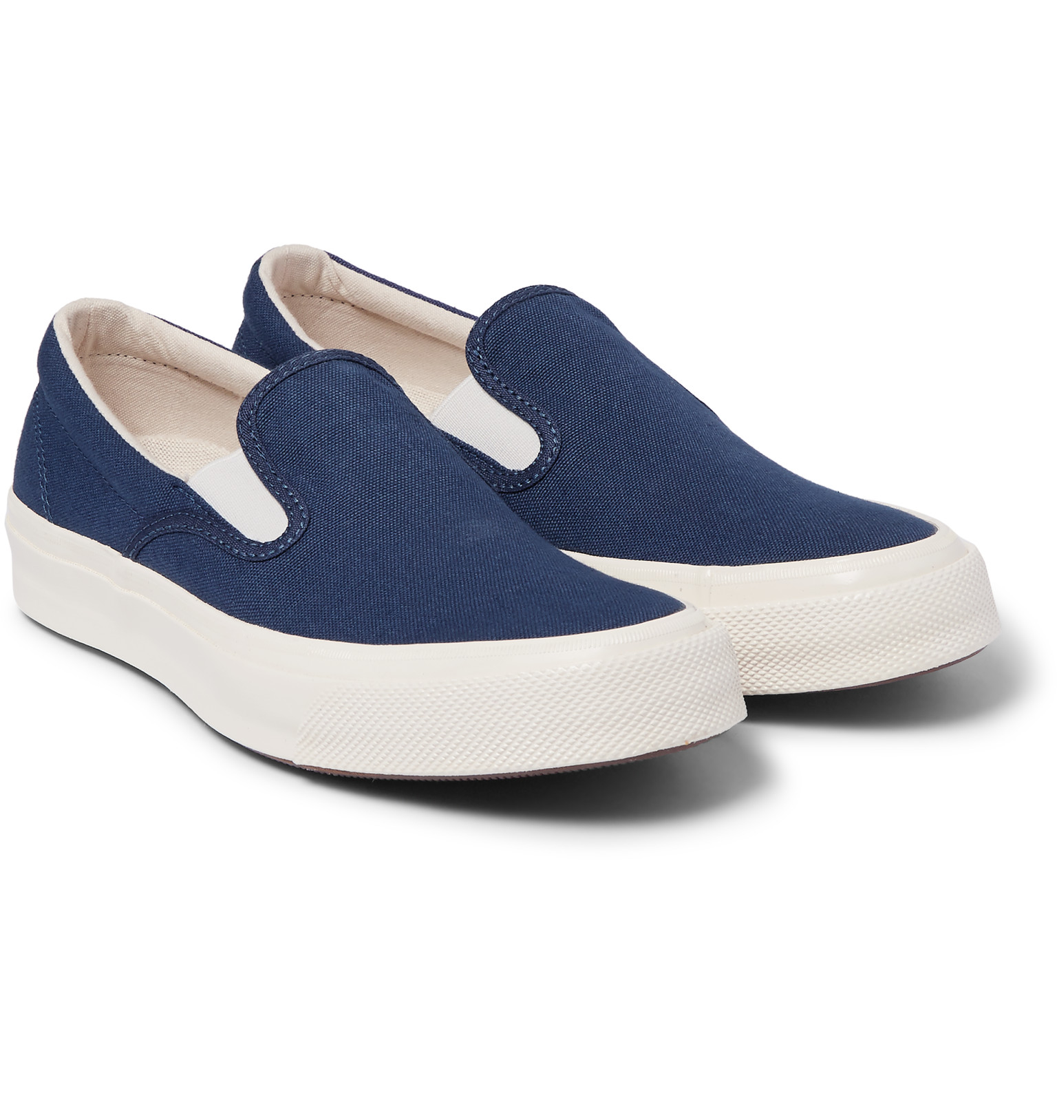 navy blue slip on converse