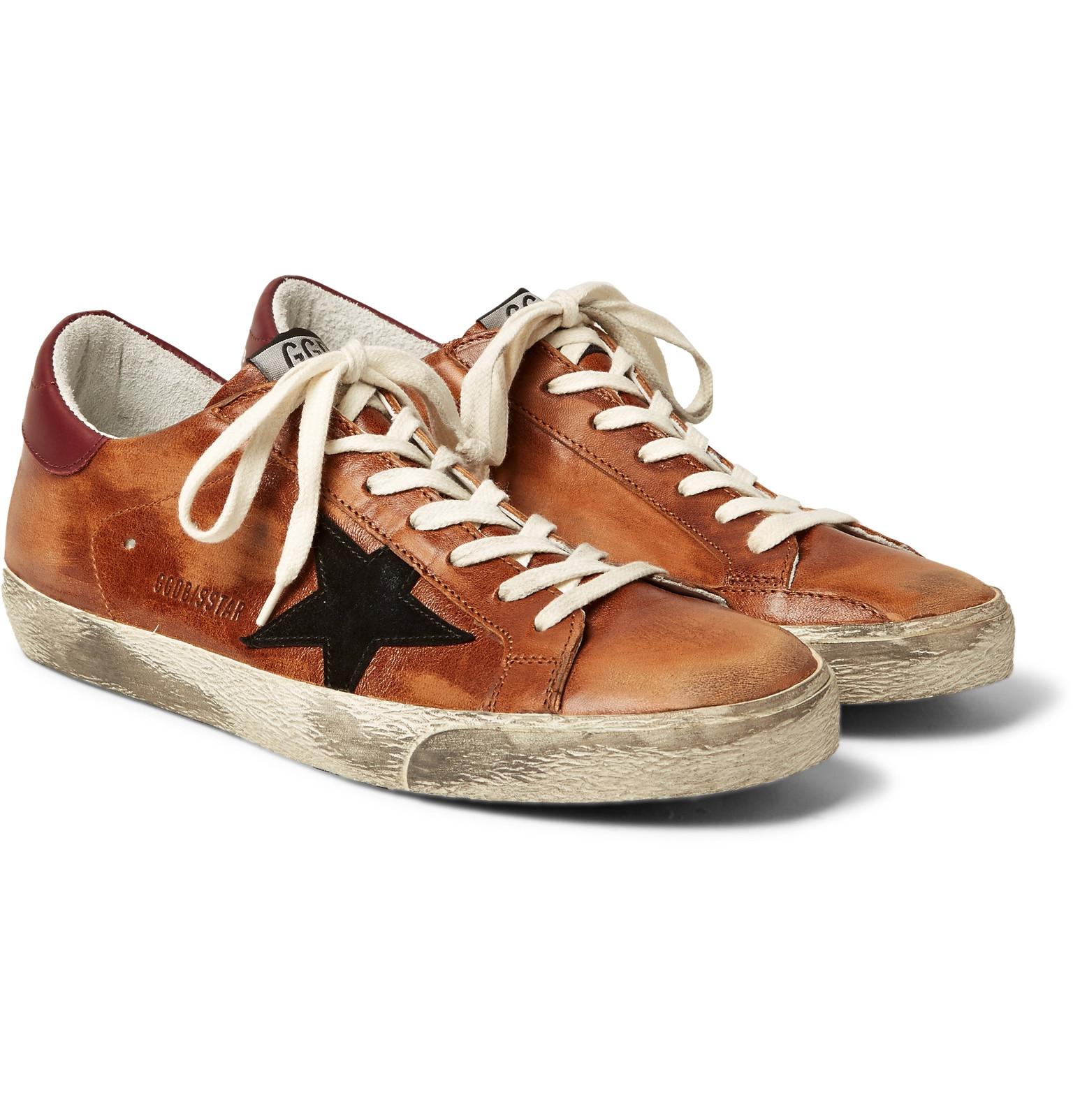 superstar distressed leather and suede sneakers