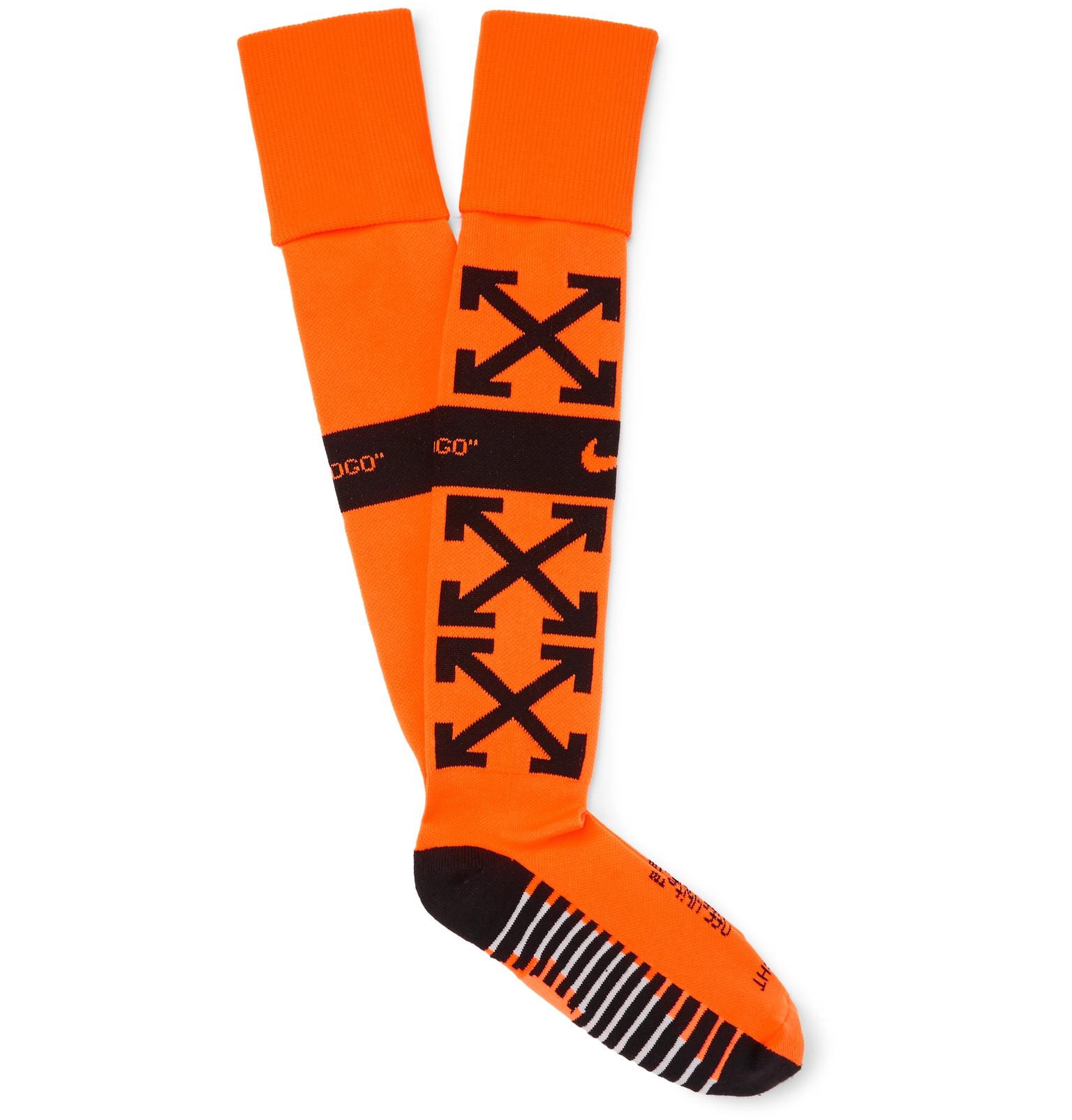 white and orange nike socks