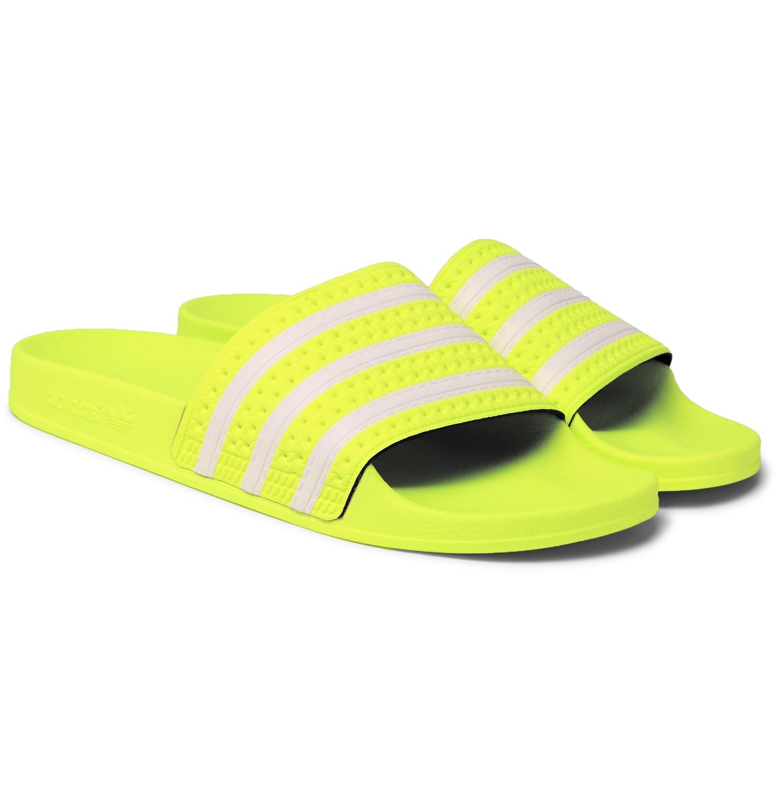 yellow adidas sliders