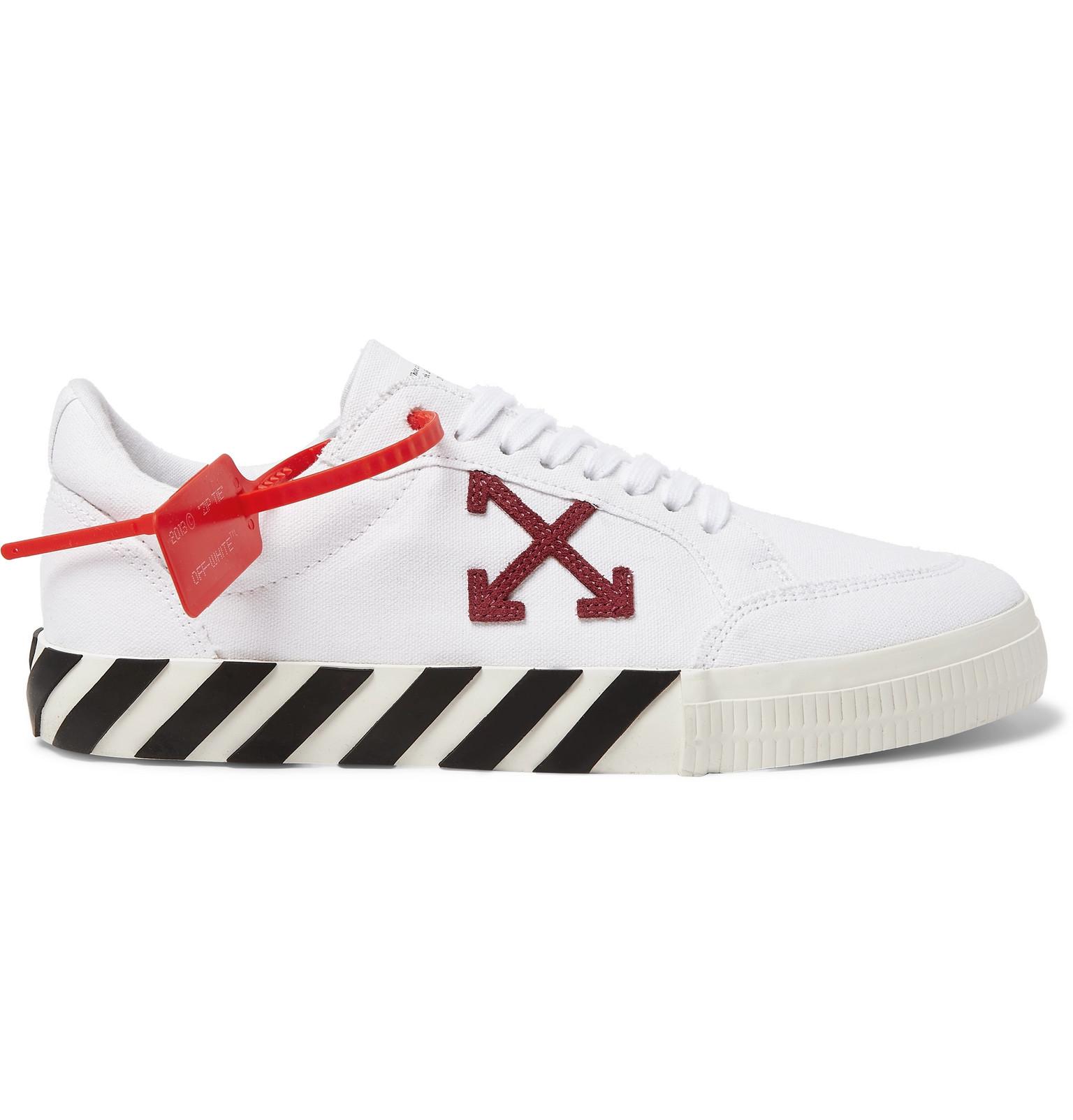 off white canvas low top sneakers