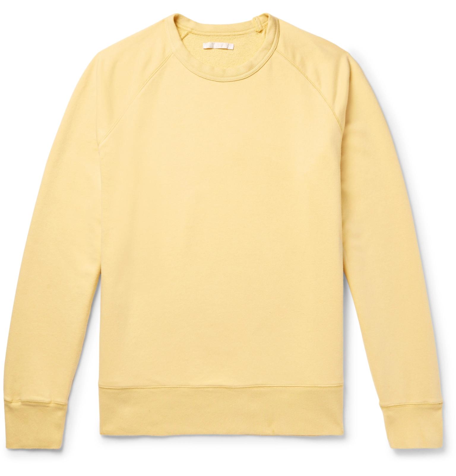 pastel yellow sweatshirt