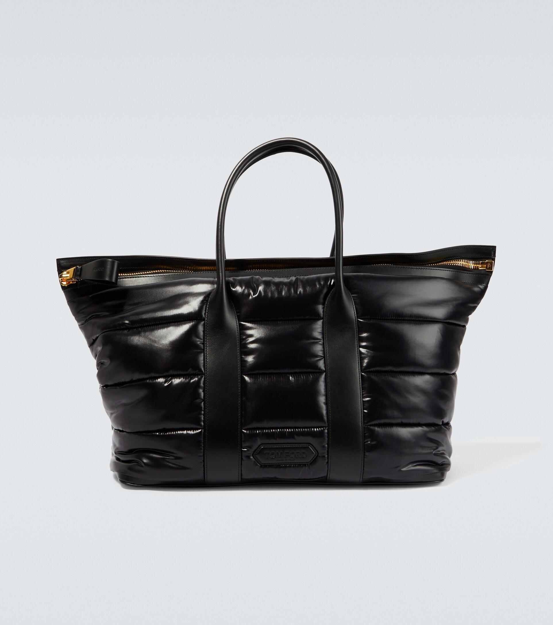 Givenchy Black Grained Patent Leather Backpack, $1,990, SSENSE