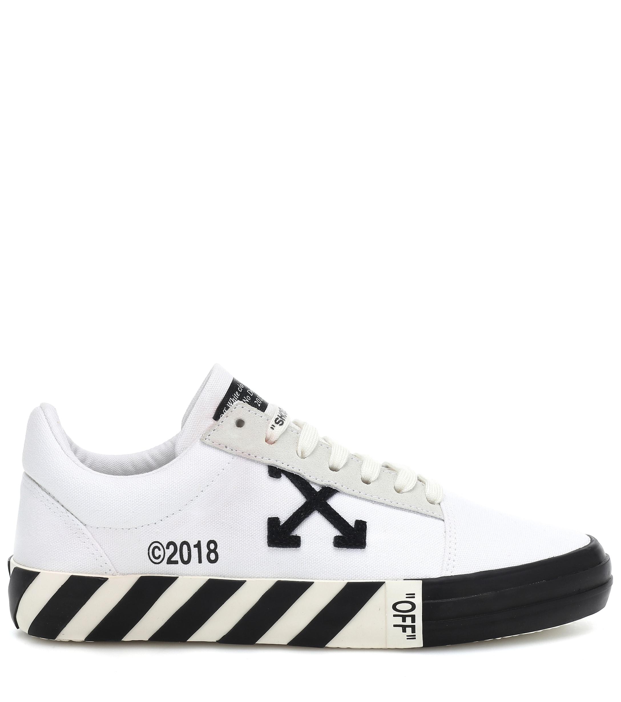 vulc canvas trainers off white