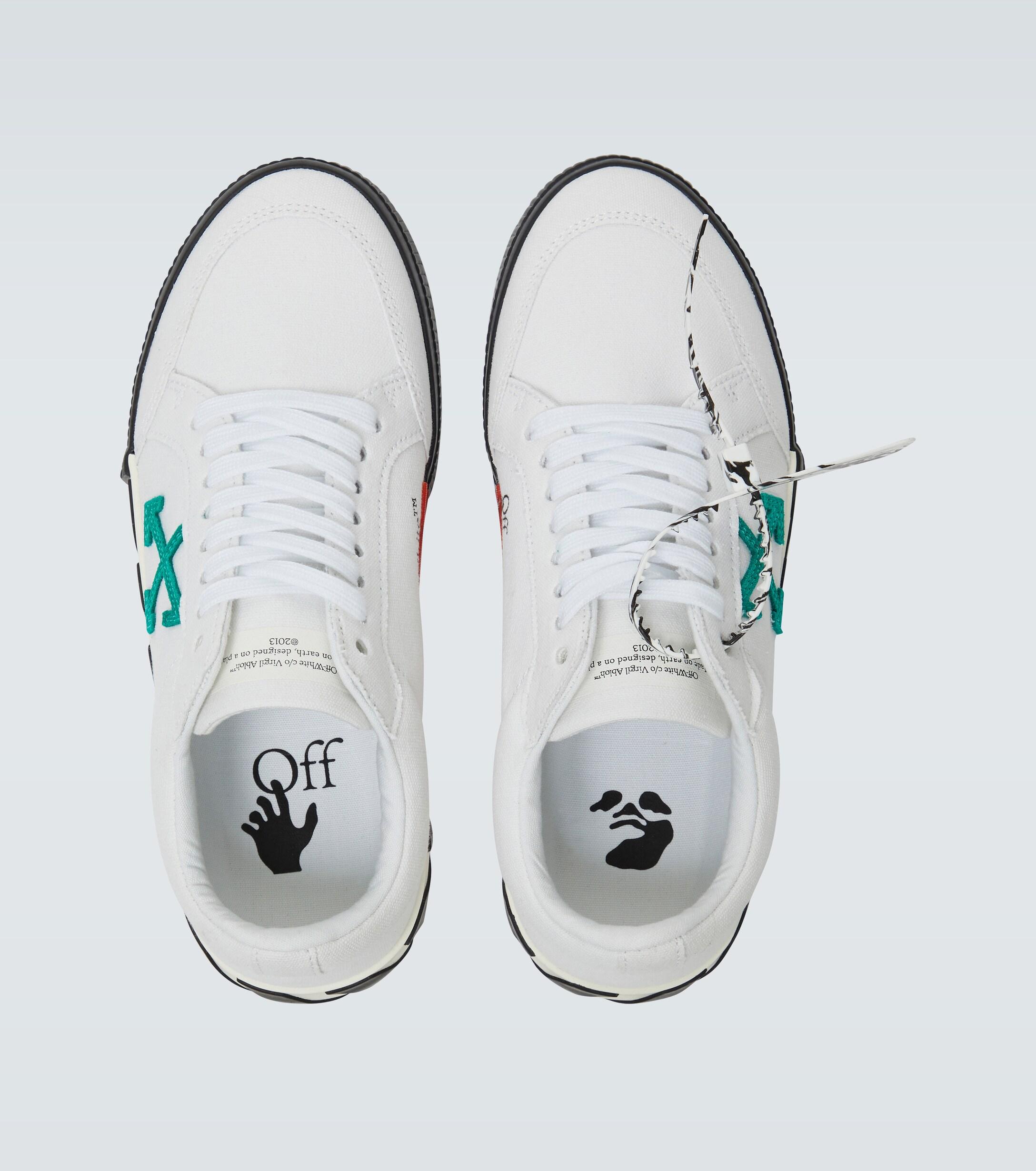 off white canvas low top sneakers
