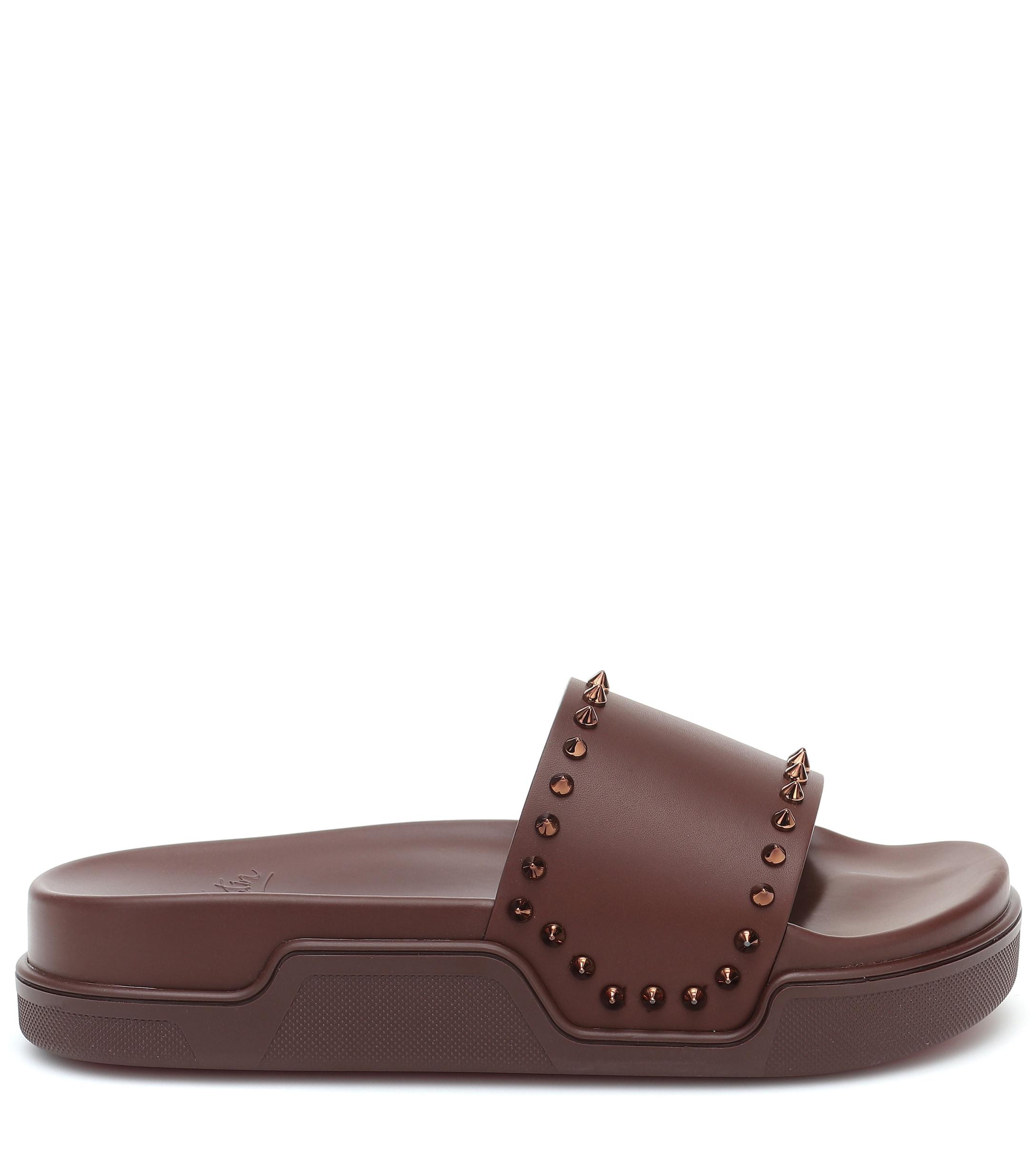 christian louboutin studded slides