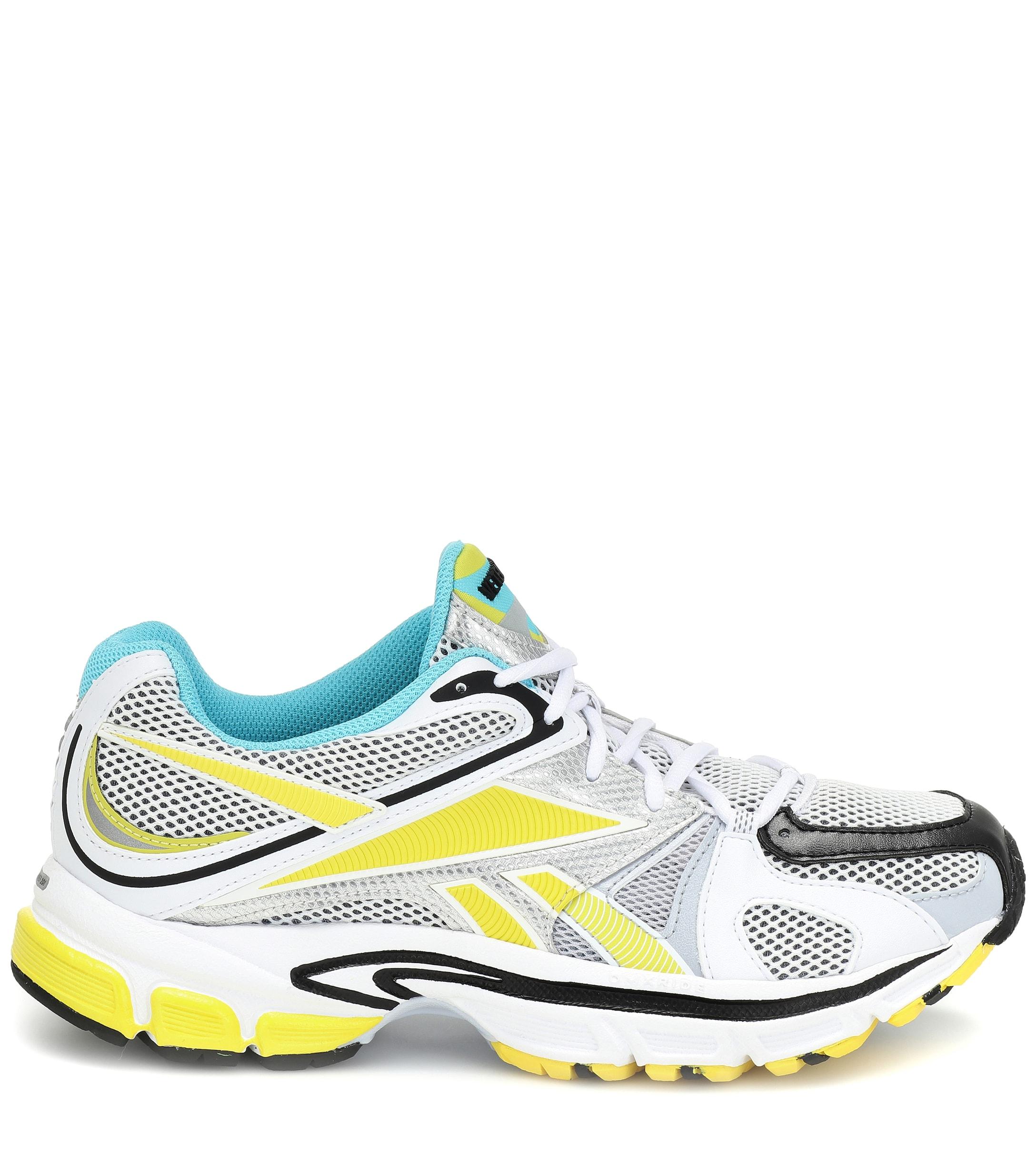 reebok spikes running shoes
