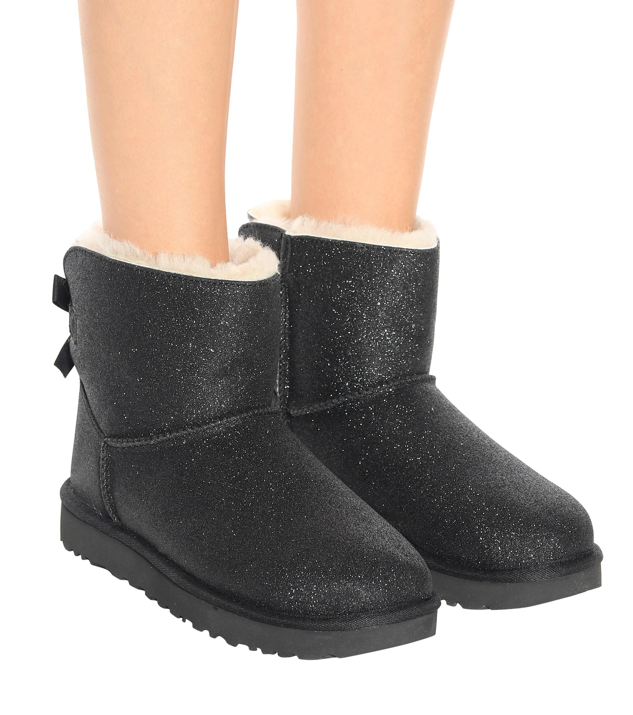 UGG Fur Mini Bailey Bow Glitter Ankle Boots in Black - Lyst