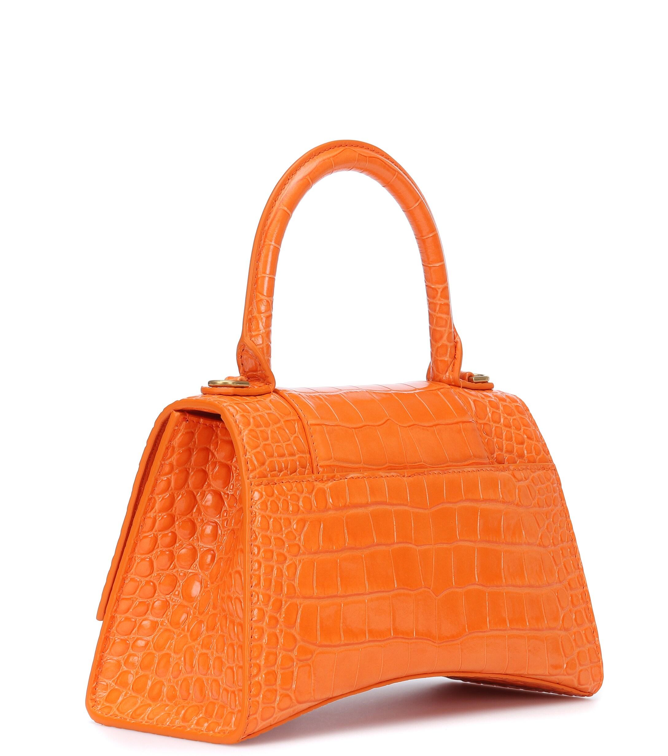 Orange balenciaga sale purse