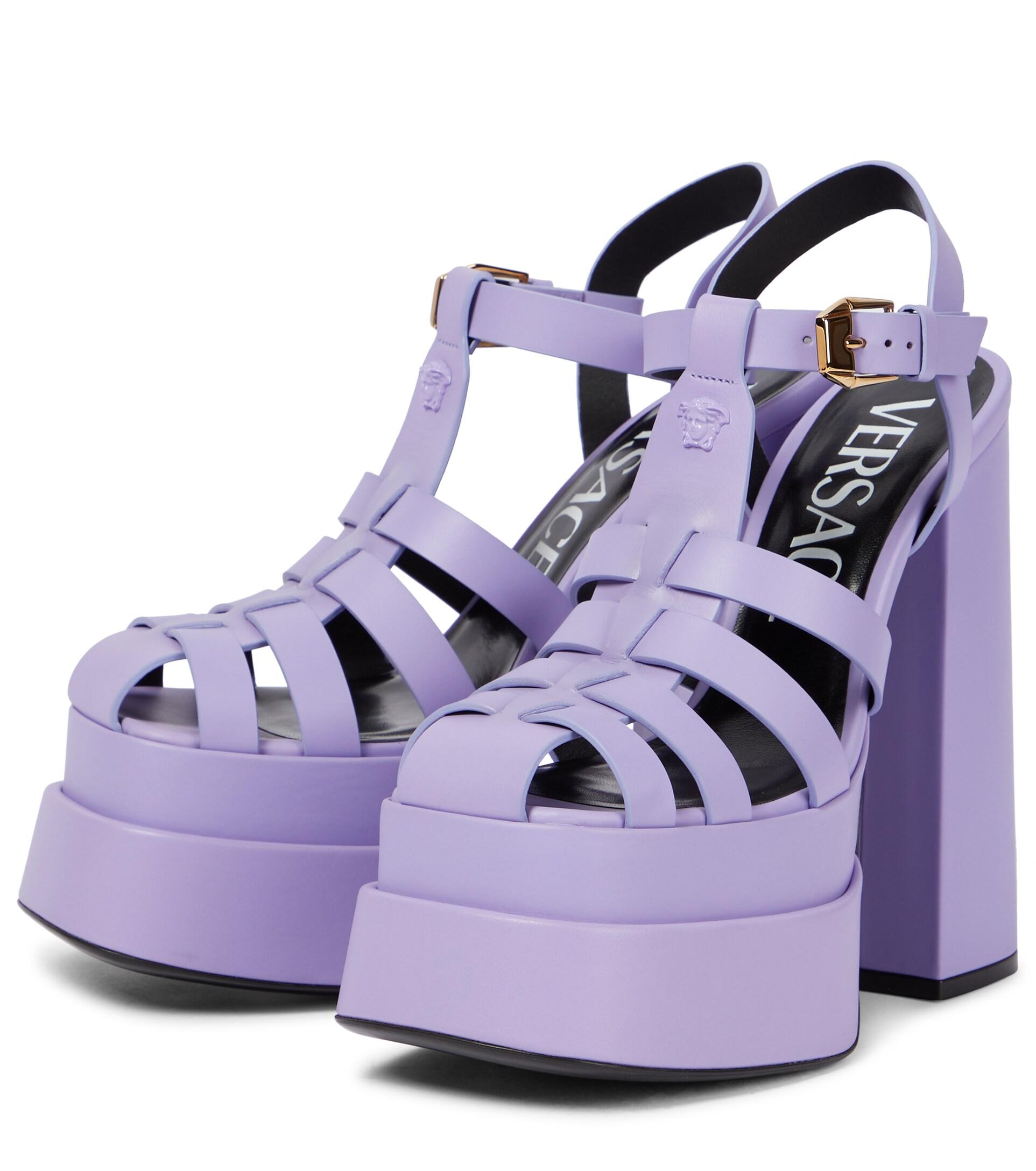 https://cdna.lystit.com/photos/mytheresa/3477f646/versace-purple-La-Medusa-Leather-Plateau-Sandals.jpeg