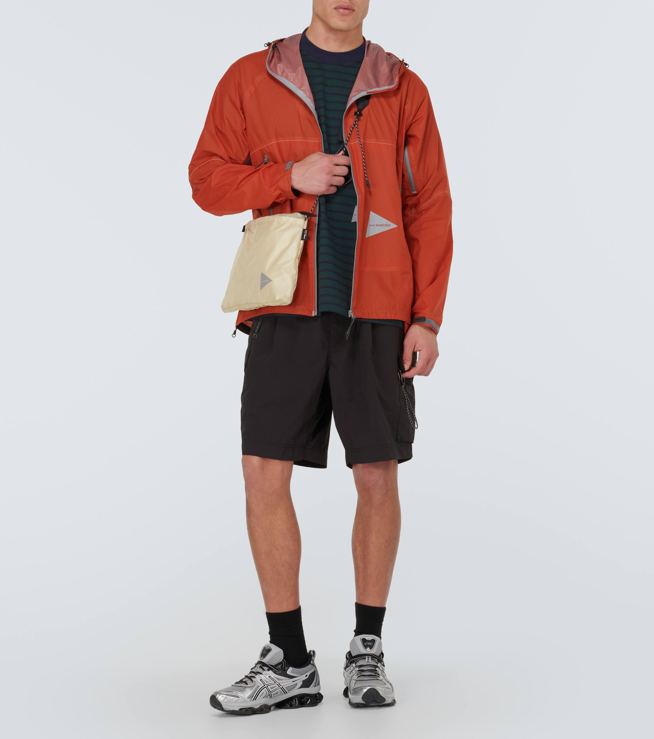 and wander 3L Ul Pertex Shield Raincoat in Orange for Men | Lyst UK