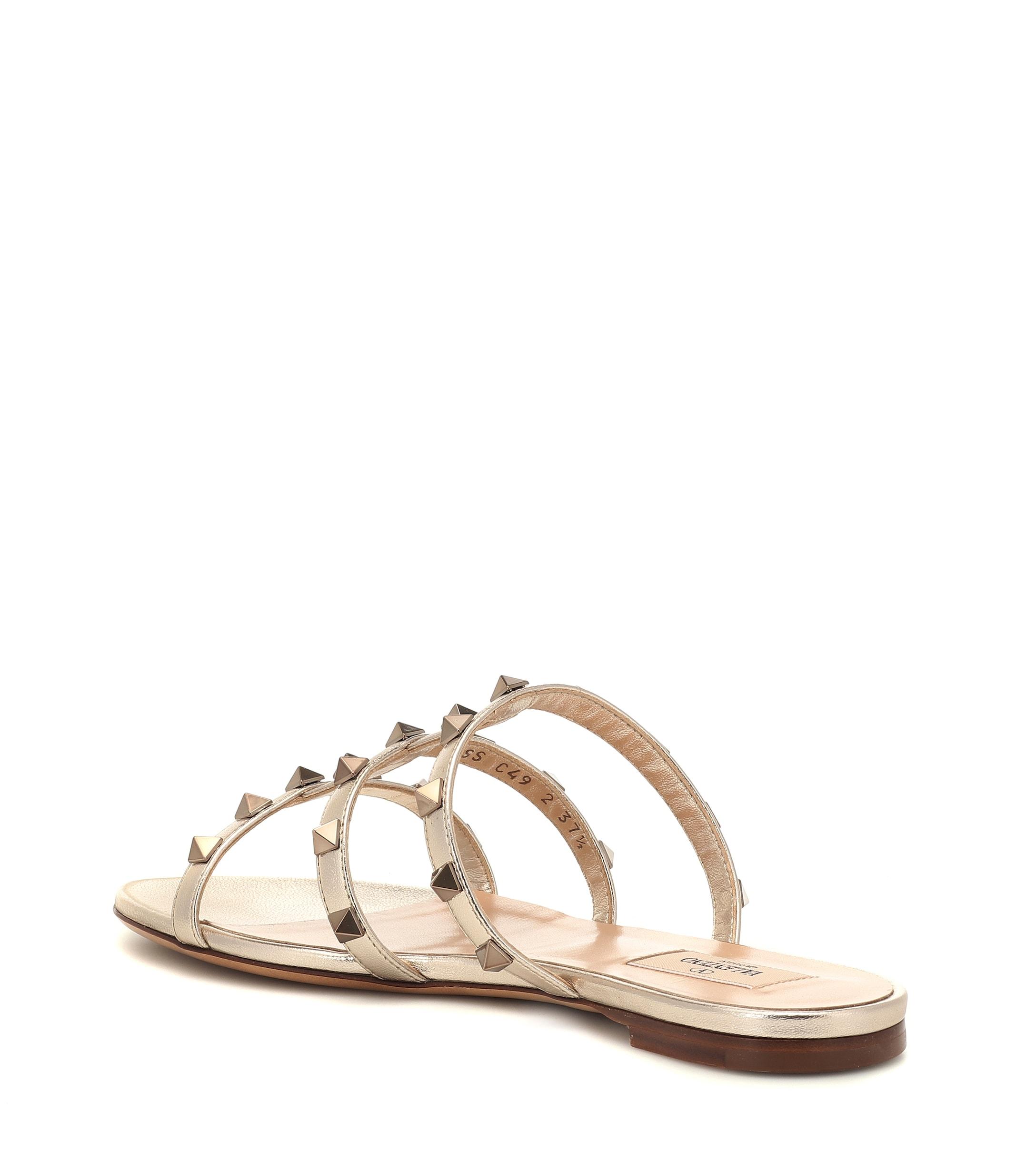 valentino rockstud flat sandals gold