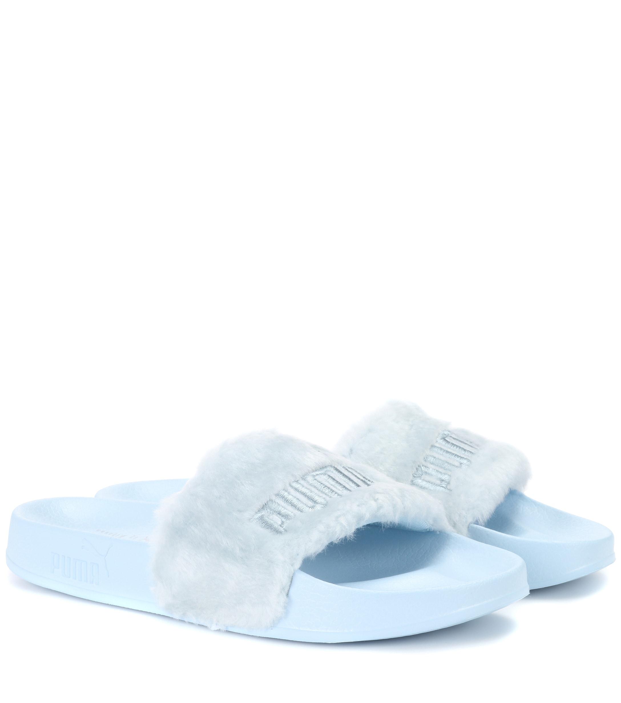 blue puma slides