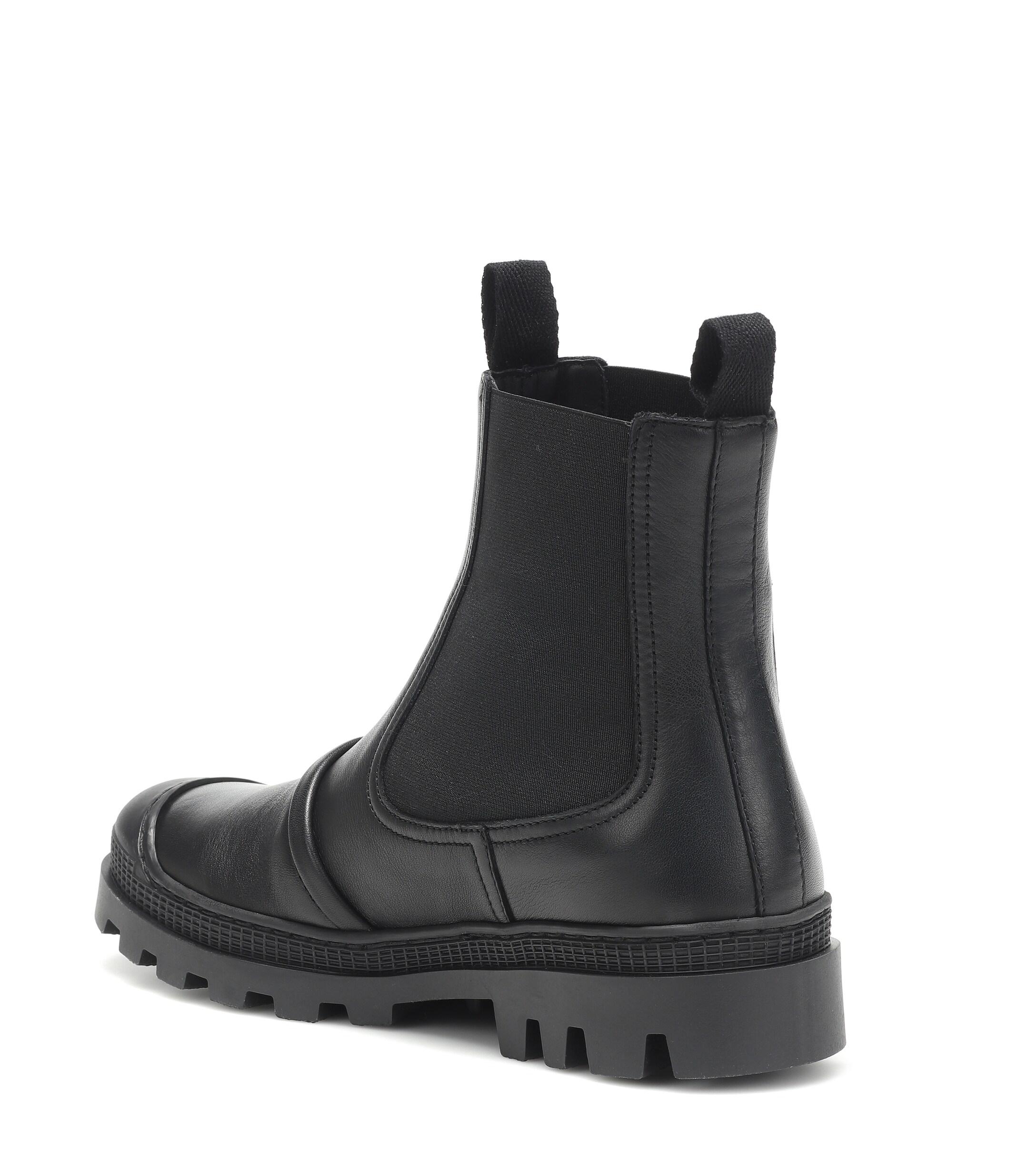 loewe logo print canvas trimmed leather ankle boots