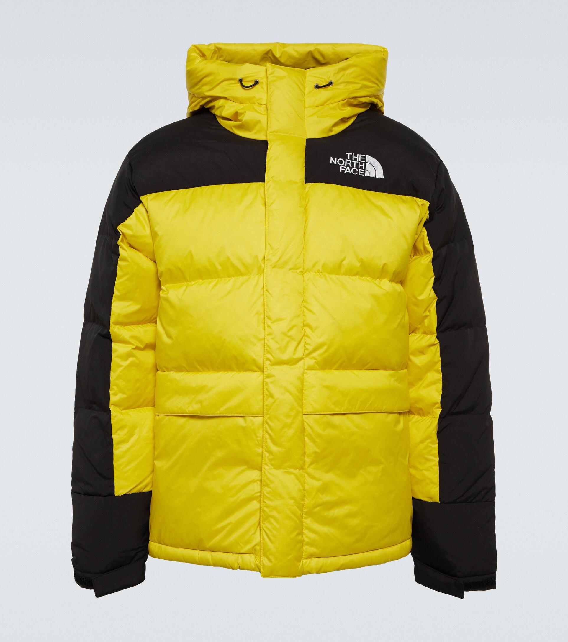 the north face himalayan parka jacket in yellow