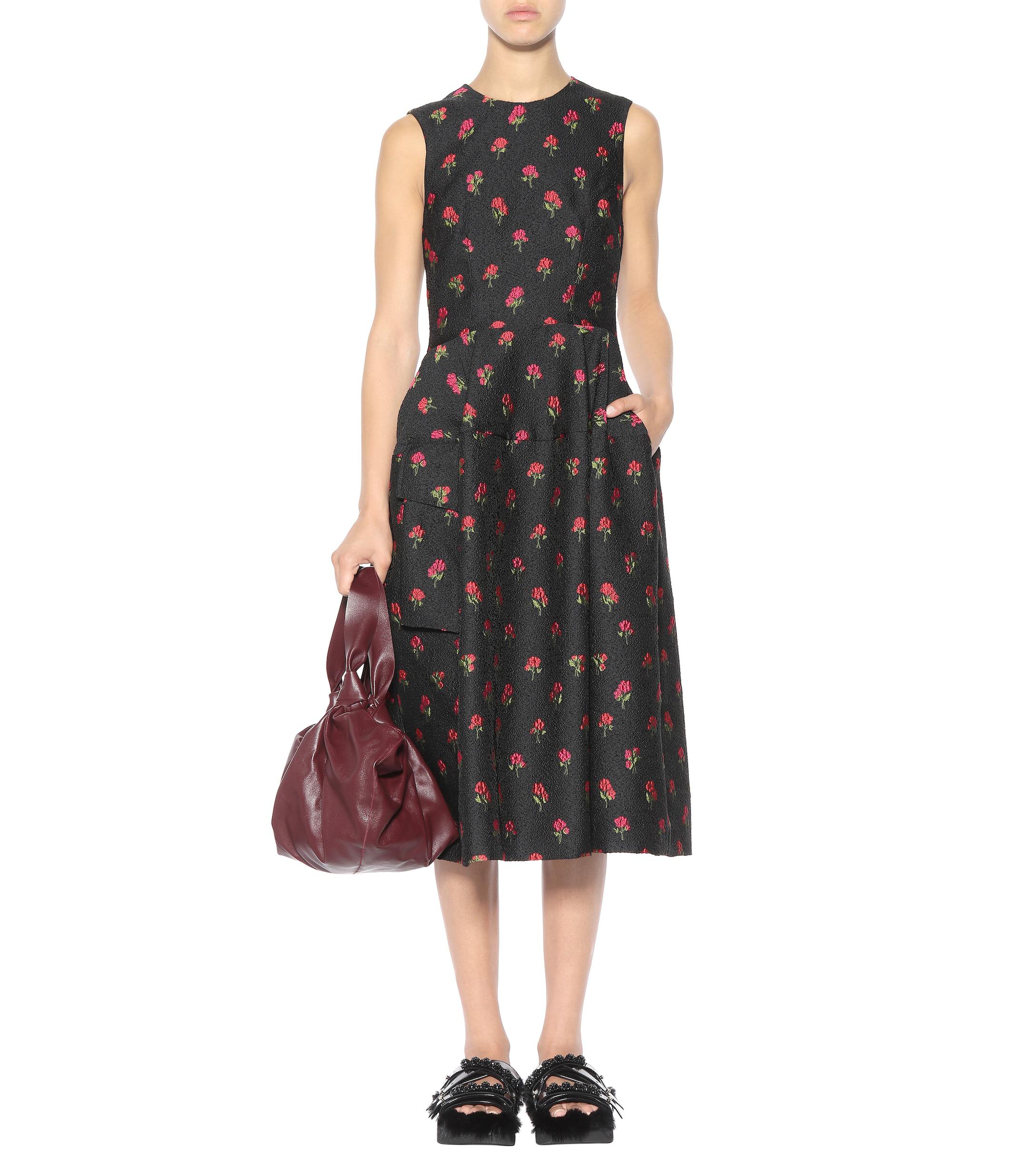black dress with red embroidered flowers