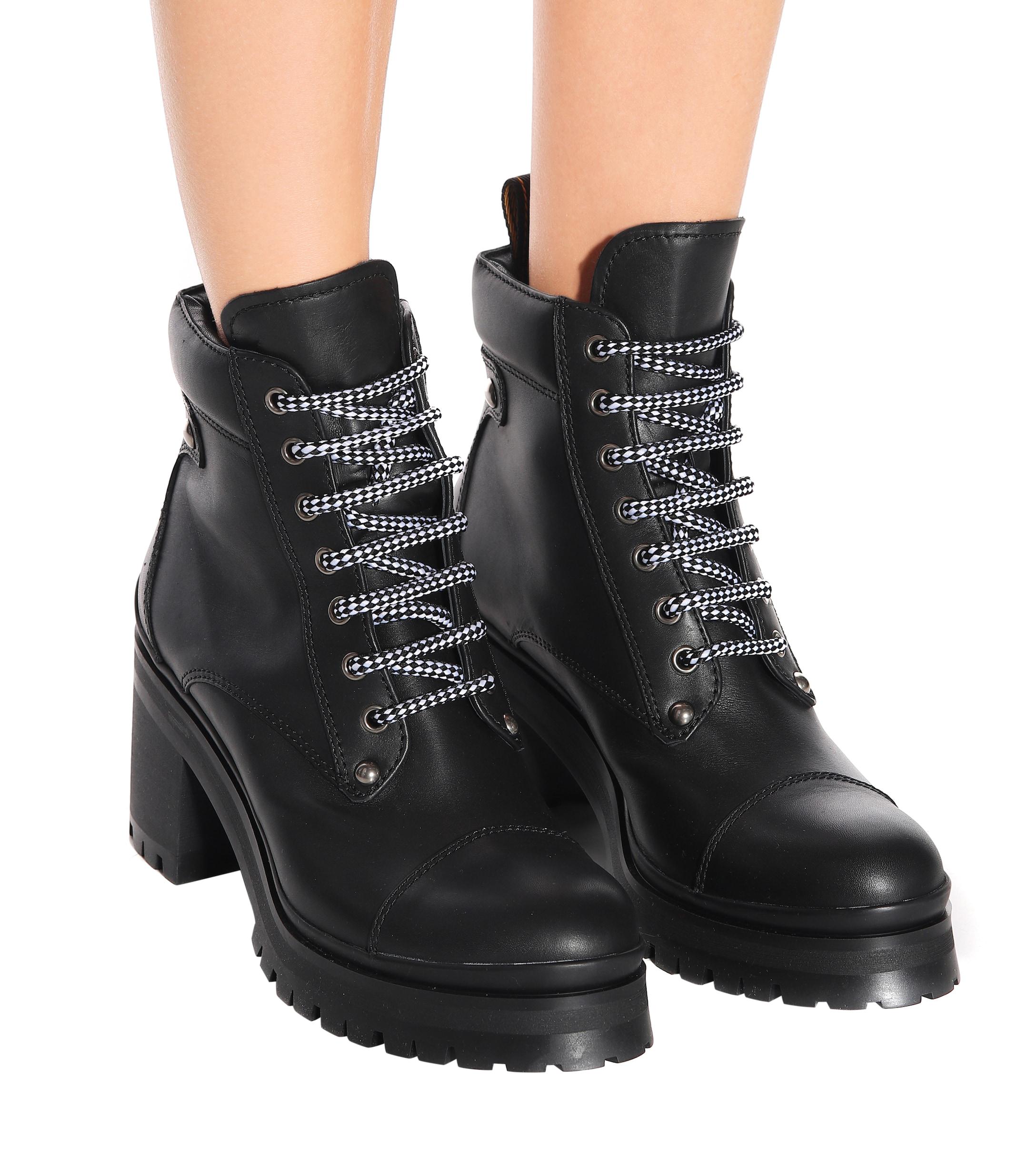 Miu Miu Lug-sole Leather Ankle Boots in 