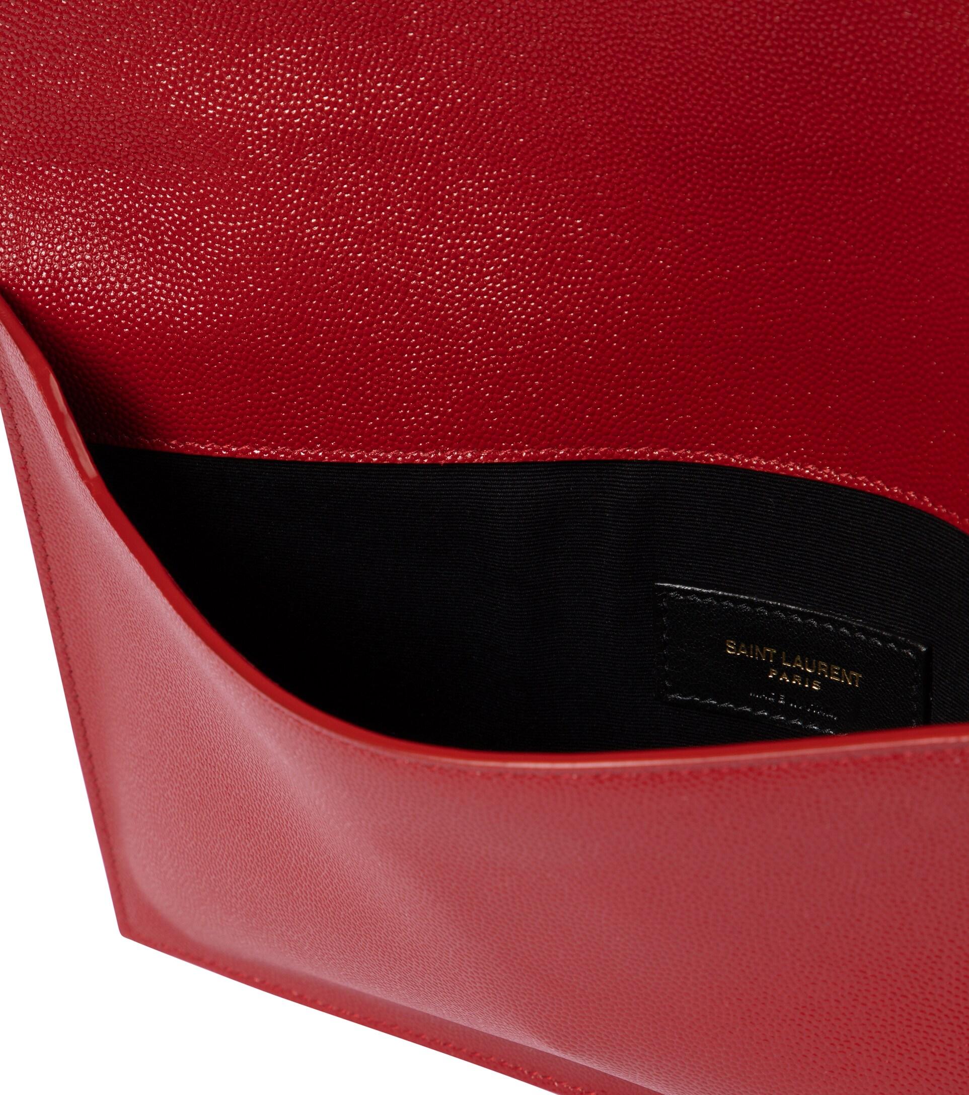Saint Laurent Uptown leather-trimmed raffia clutch