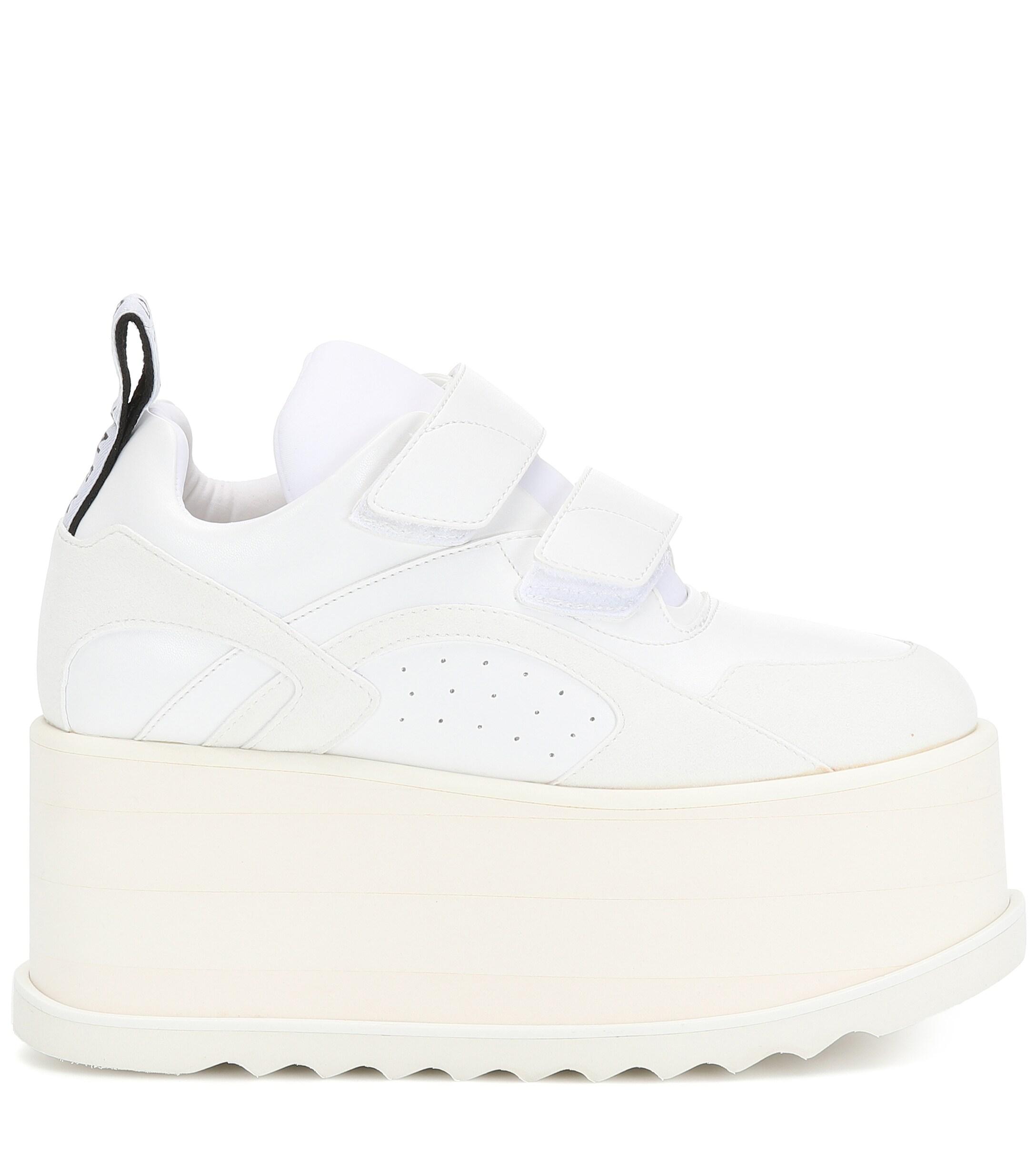 white plateau sneakers