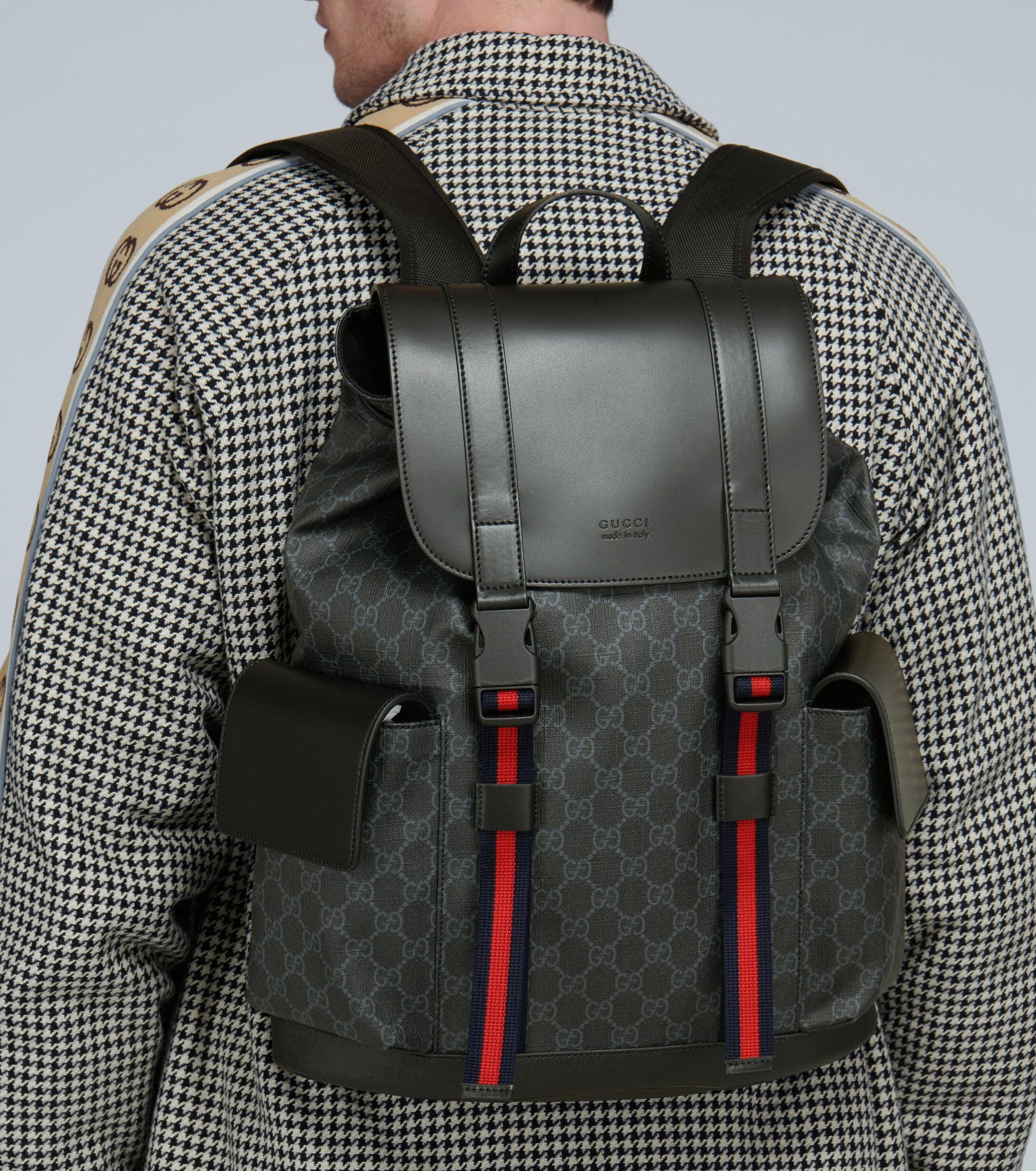 gucci supreme black backpack