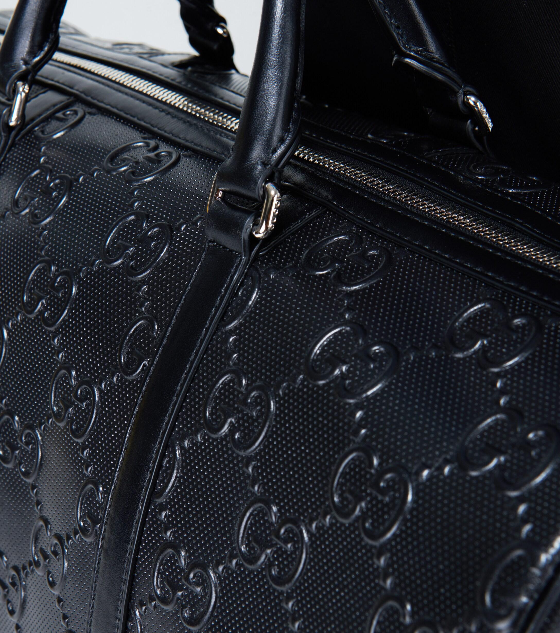 Gucci GG Embossed Duffle Bag in Black for Men | Lyst