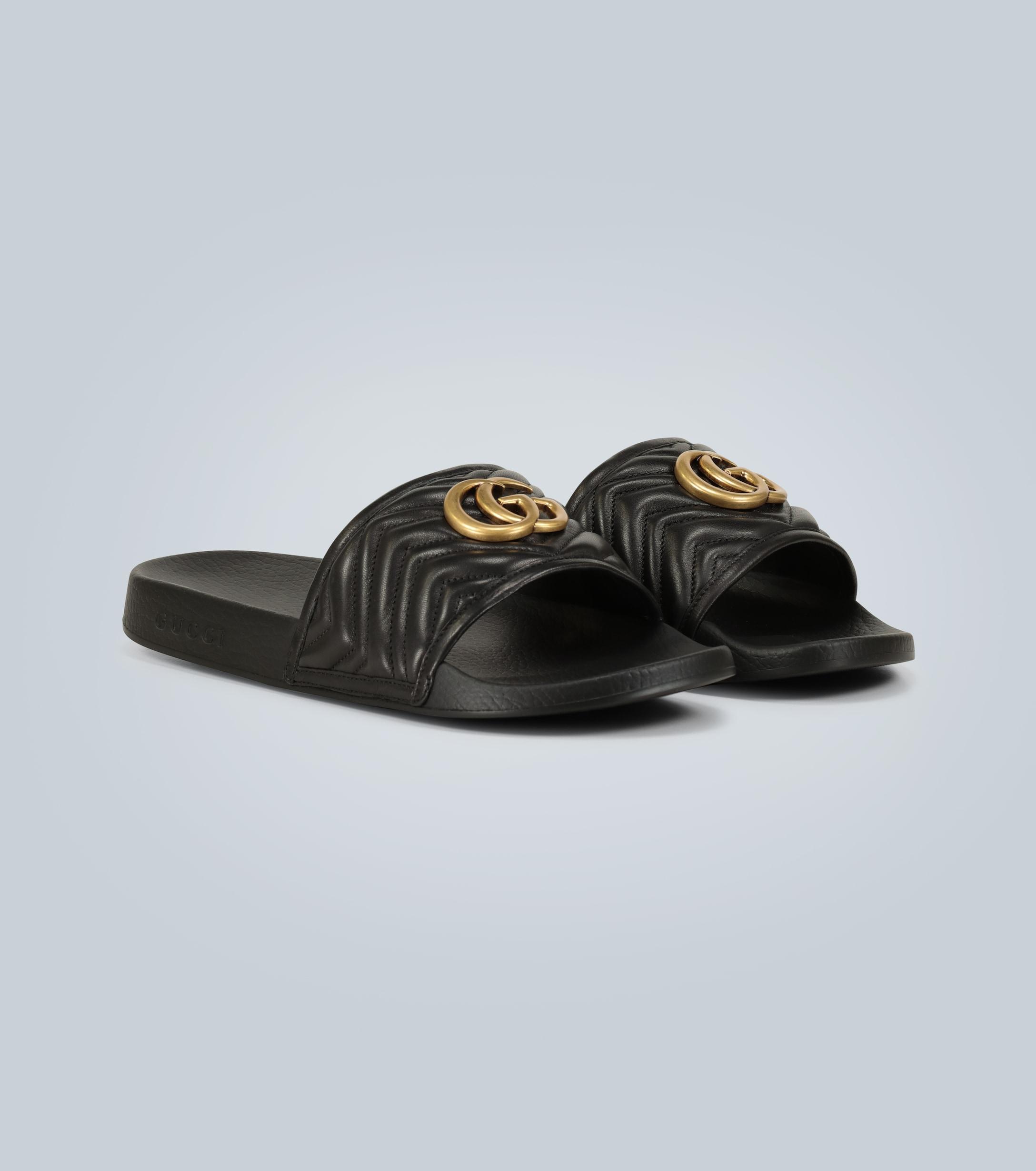Gucci Pursuit Logo-embossed Leather Slides in Black | Lyst