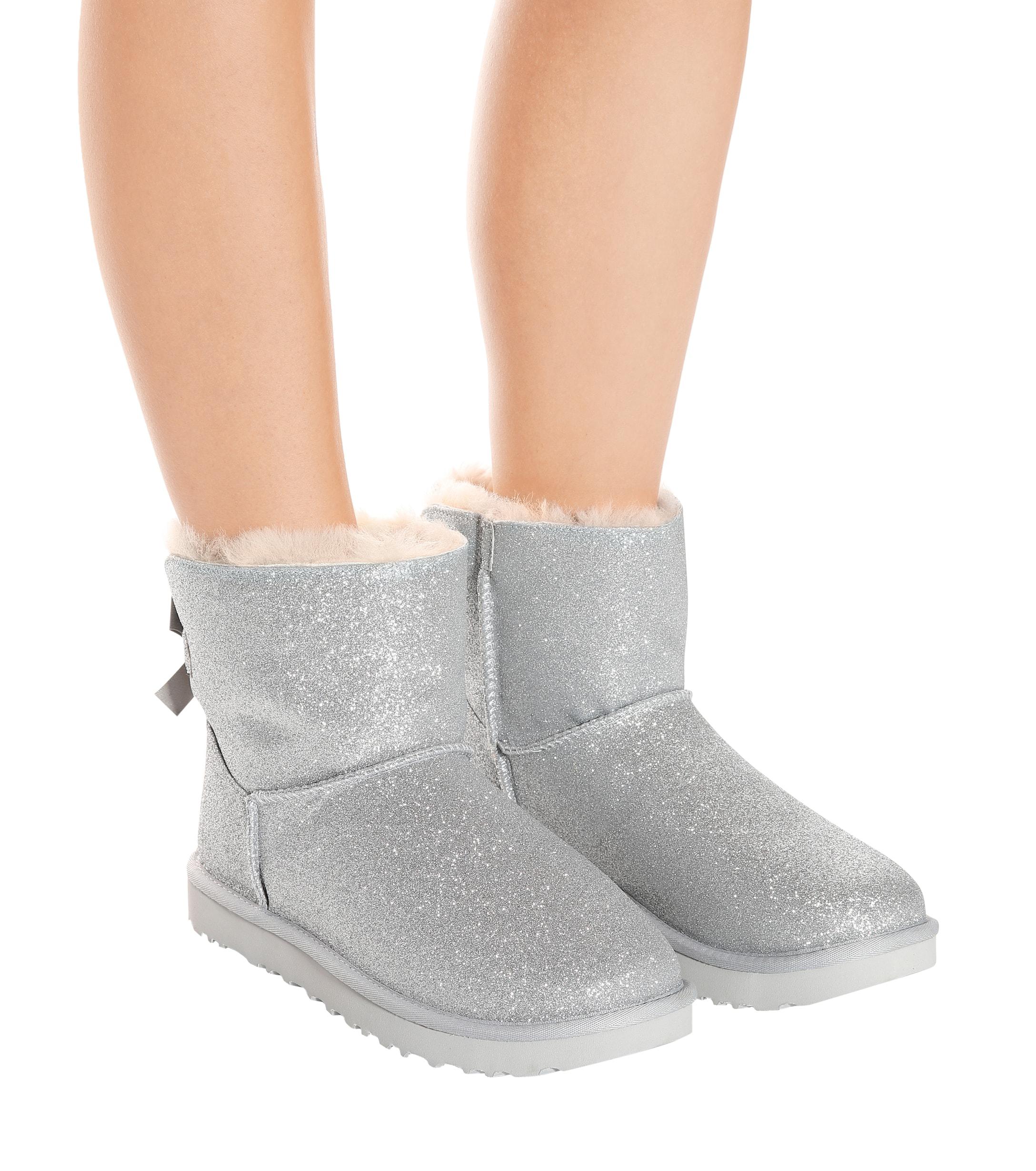 UGG Mini Bailey Bow Glitter And Silver Sheepskin Ankle Boots Women's ...