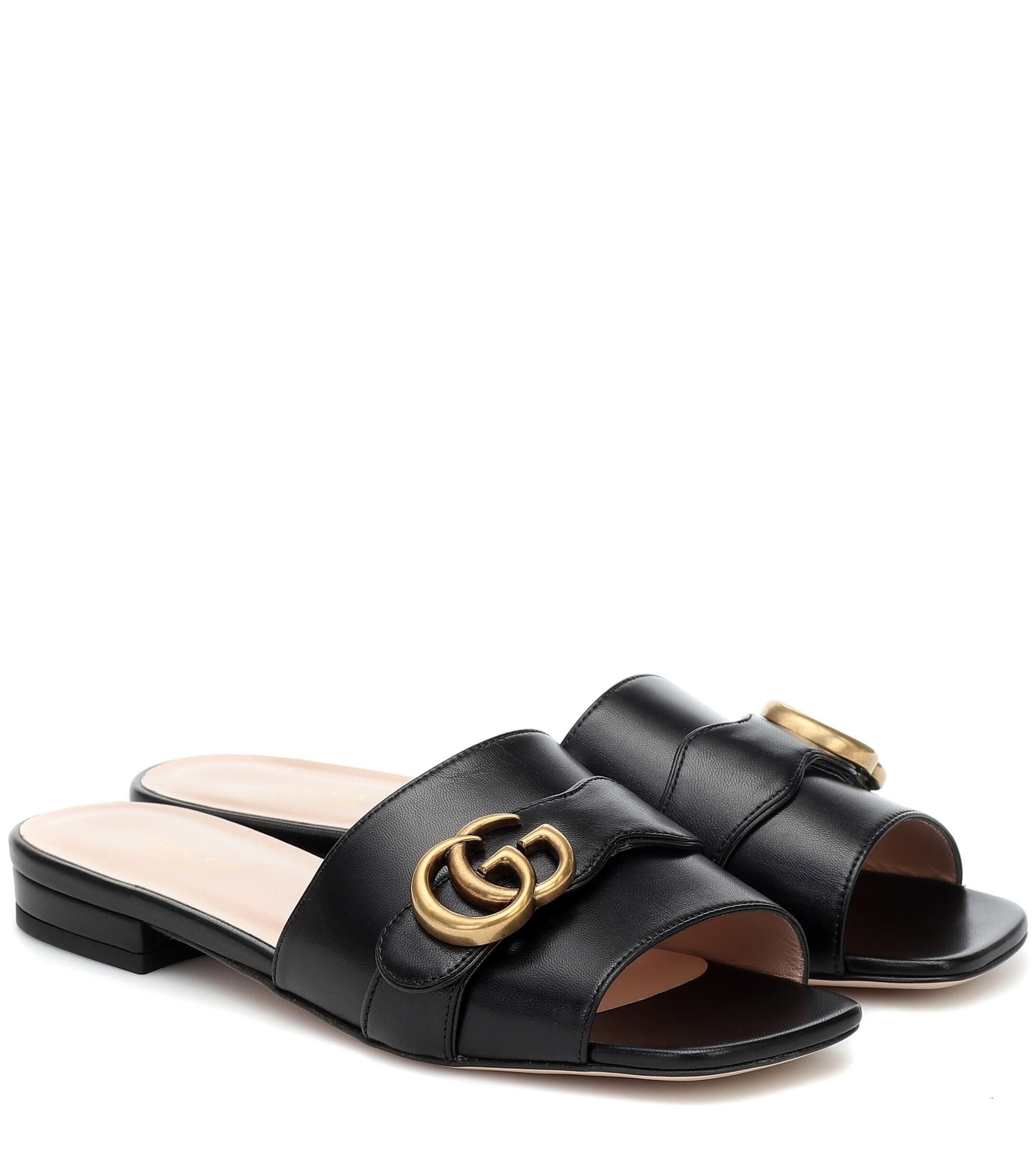 Gucci Double G Leather Slides in Black - Lyst